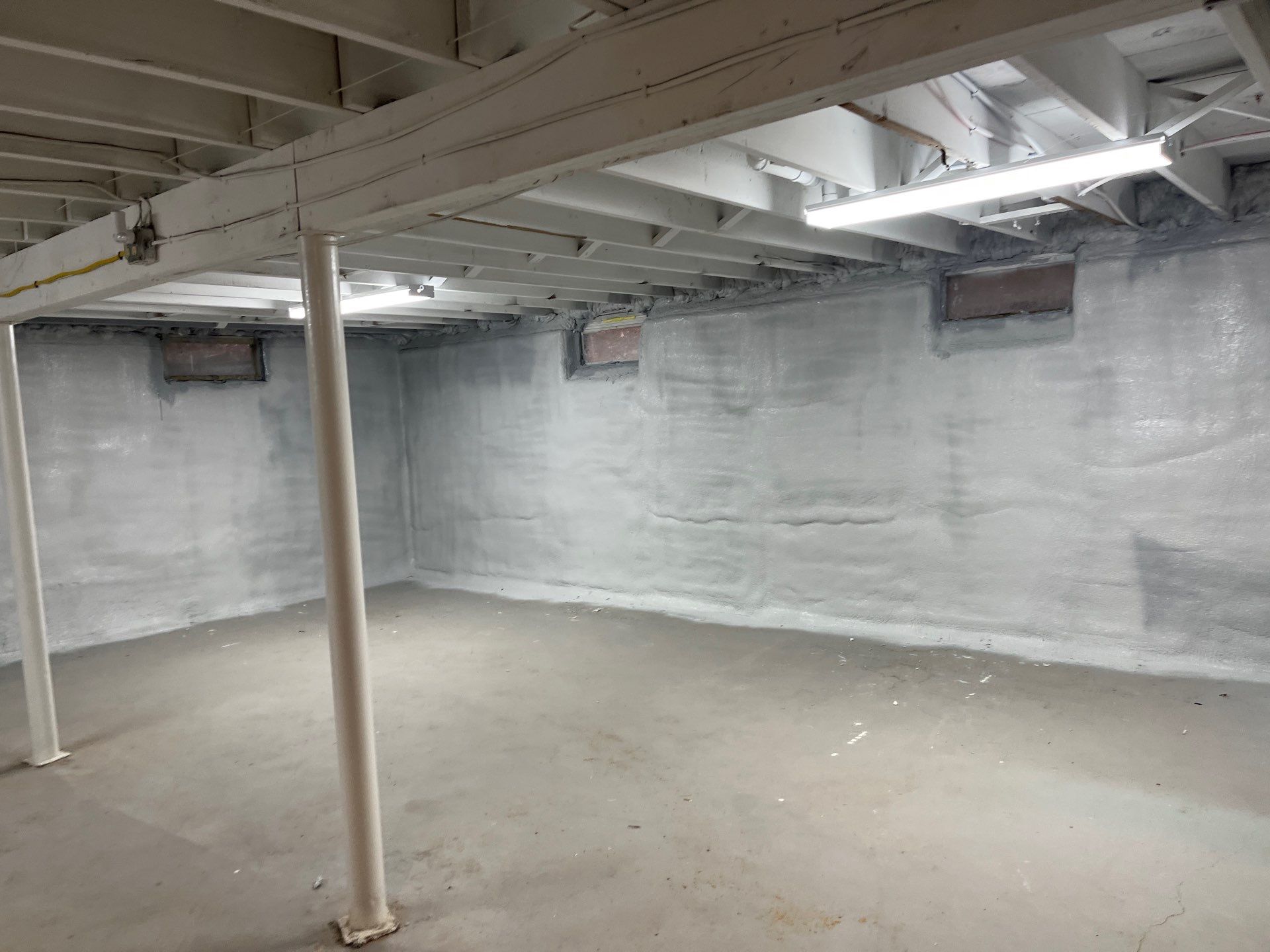 Basement Exterior Walls using Closed Cell Spray Foam by NYS Foam & Energy
