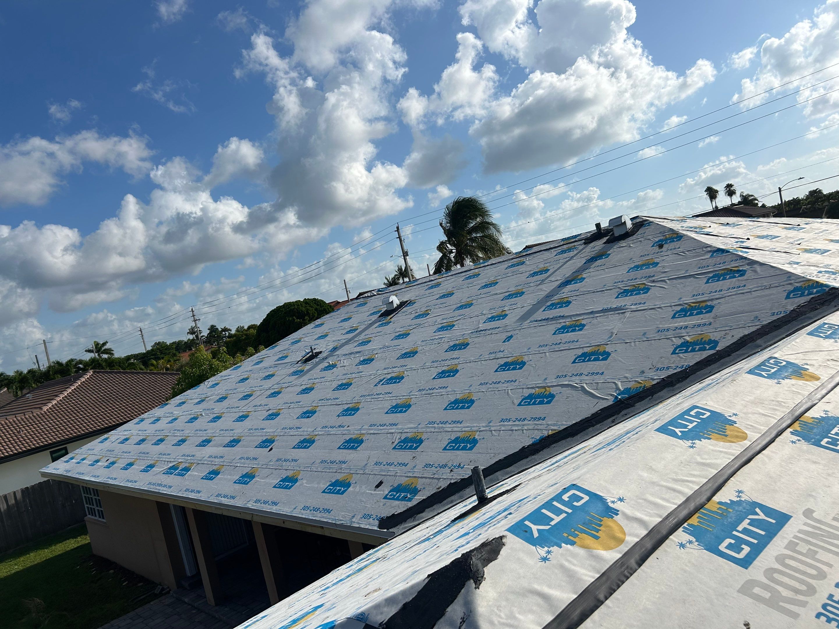 Residential Roofing Installation using Tile Roof by City Roofing Inc