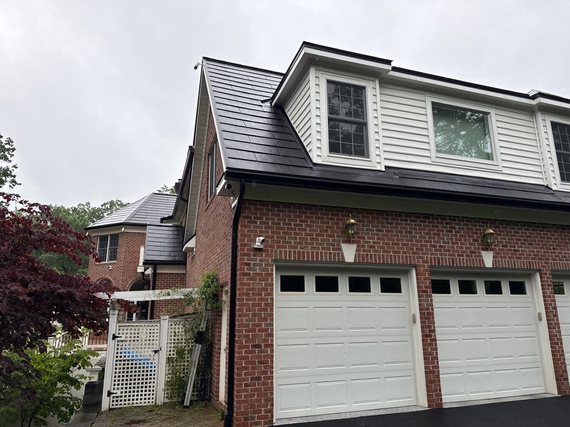 Tesla Solar Roof Replacement  by American Home Contractors