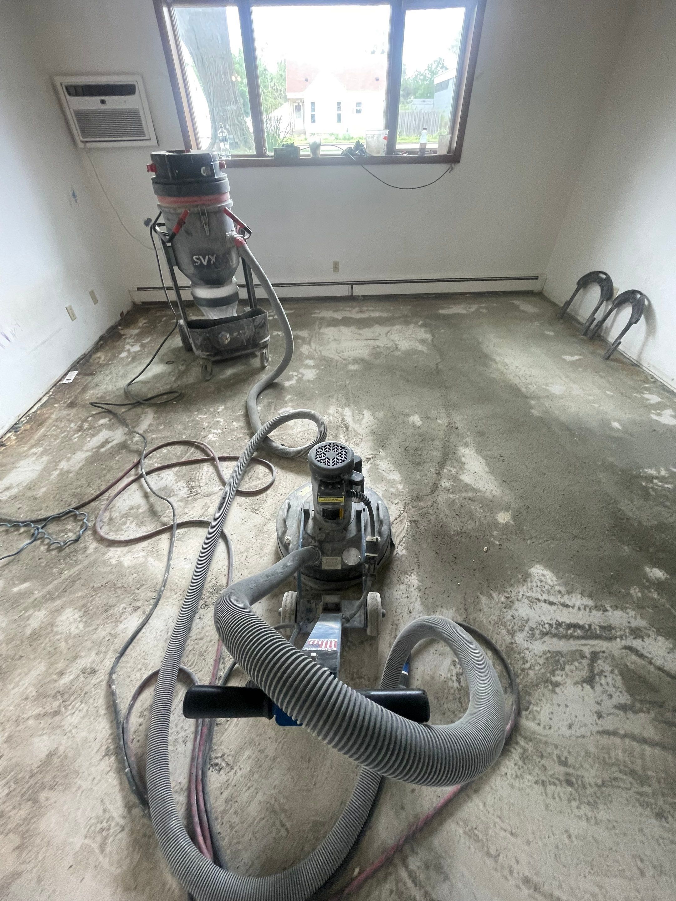 Commercial Subfloor Preparation and Flooring Restoration in Sioux Falls by Select Painting, Coatings & Garage Cabinets