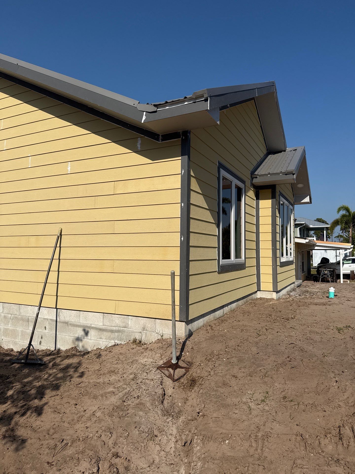 Musket Brown Seamless Gutters Installation in Saint James City, FL  by Gutter Professors