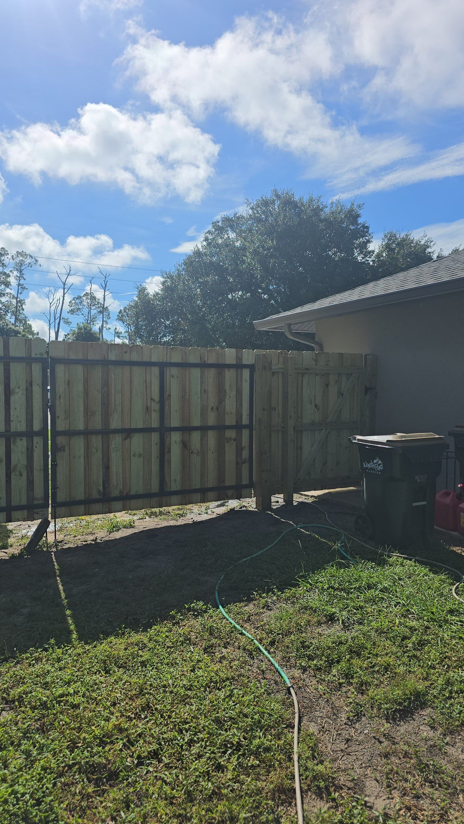 Pressure-Treated Wood Privacy Fence and Gate Installation in North Port by True Fence LLC