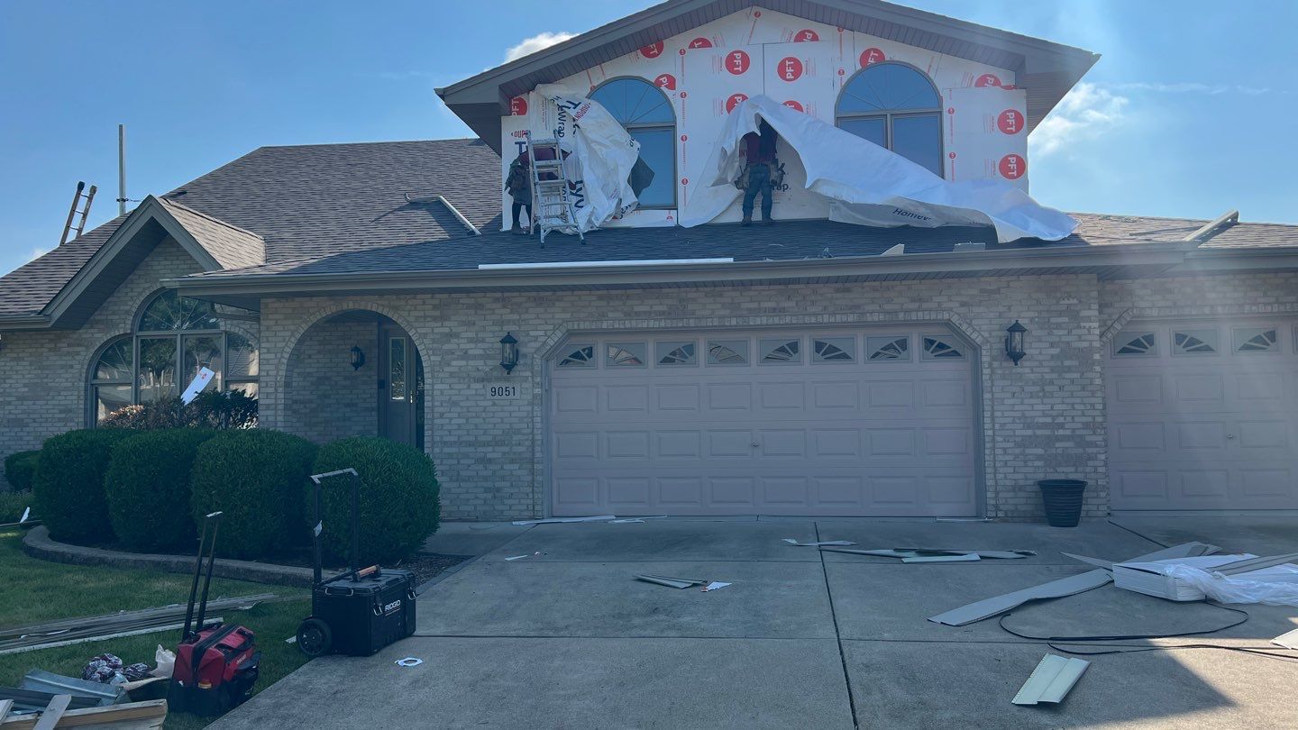 Siding replacement by Optimal Home Improvement 