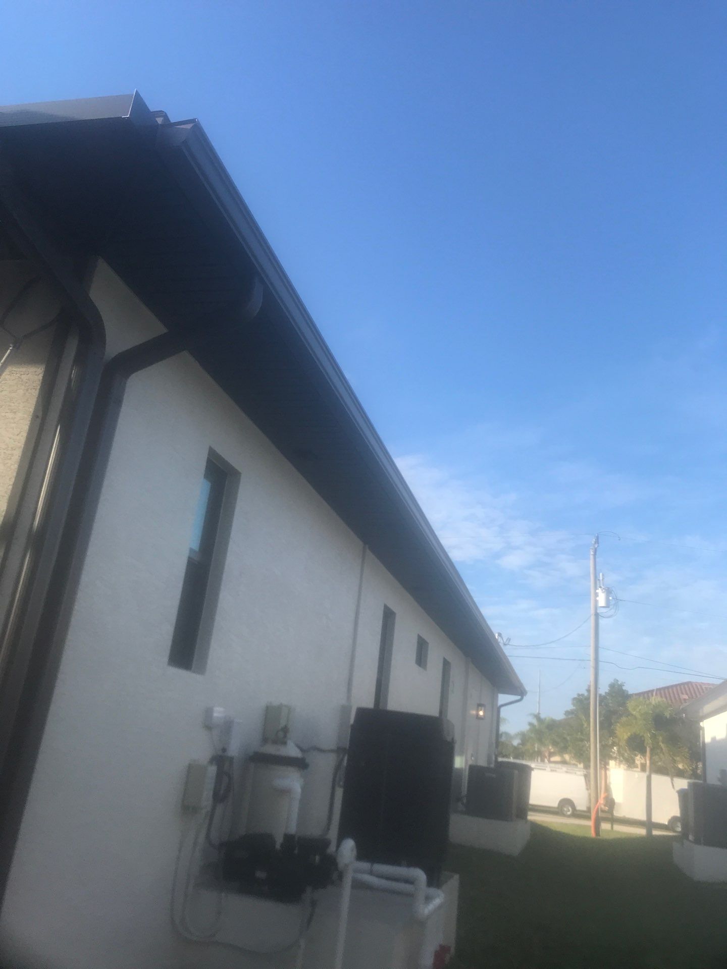 Seamless Gutter Installation using Musket Brown Seamless Gutters in Cape Coral FL by Gutter Professors