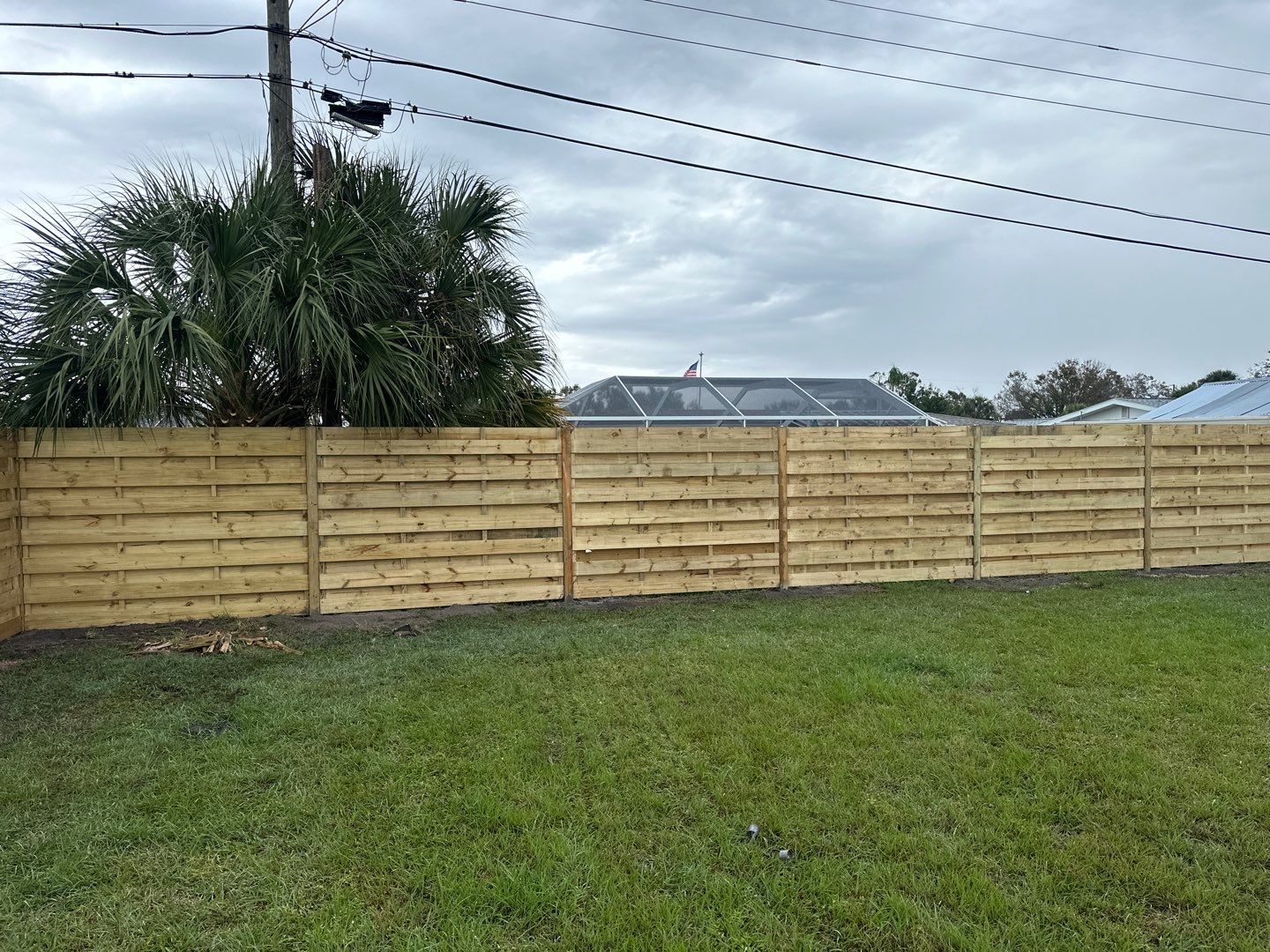 Wood Fence Installation using 6Ft Tall Pressure Treated Wood Privacy Fence by Asap fence and gates, LLC