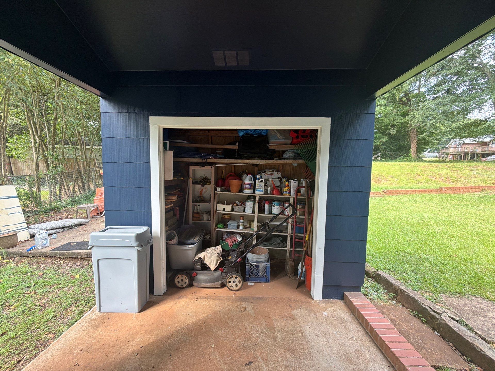 Full Exterior Repaint with Navy Blue and White Trim by Swift Home Renovations