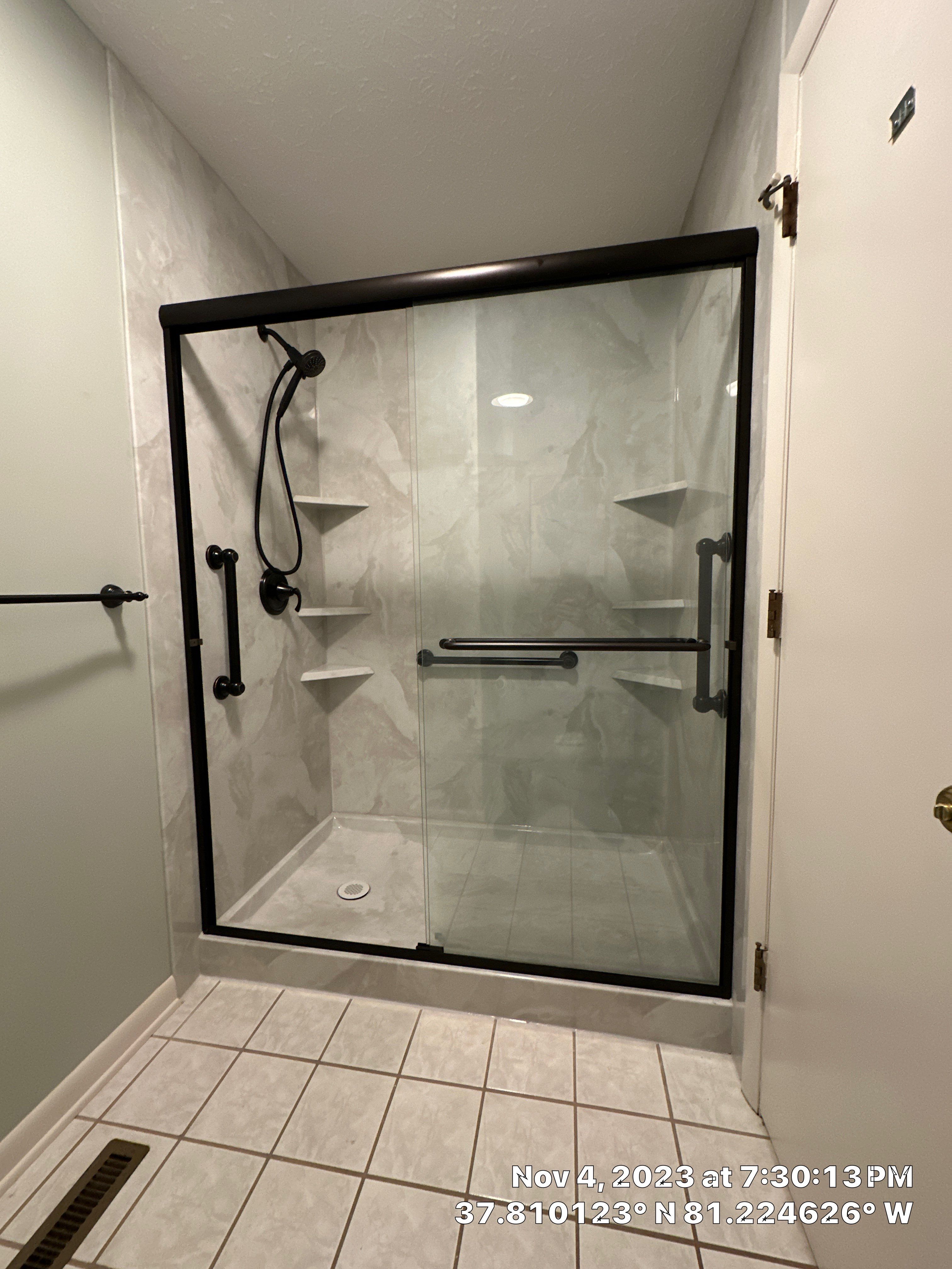 Tub to Shower Conversion using BCI Acrylic Shower System by Secure Construction Company Inc