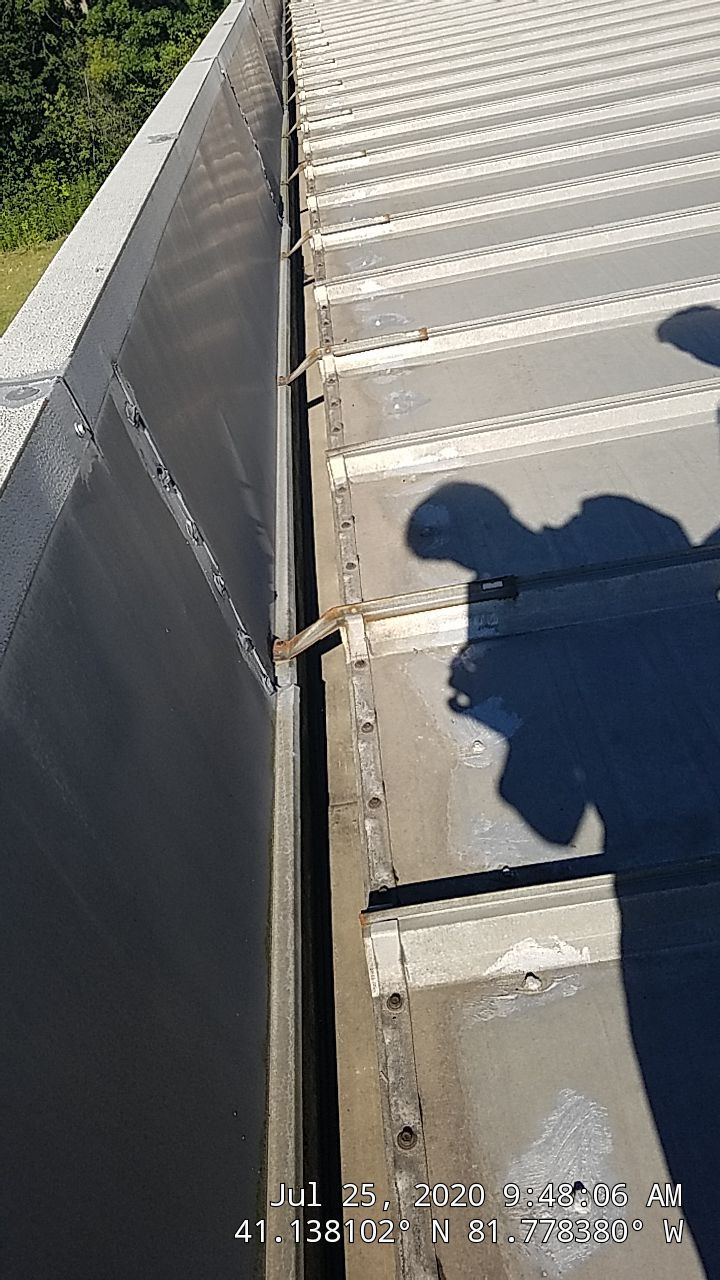 Commercial Metal Roof Coating by Gold Star Roofing LLC
