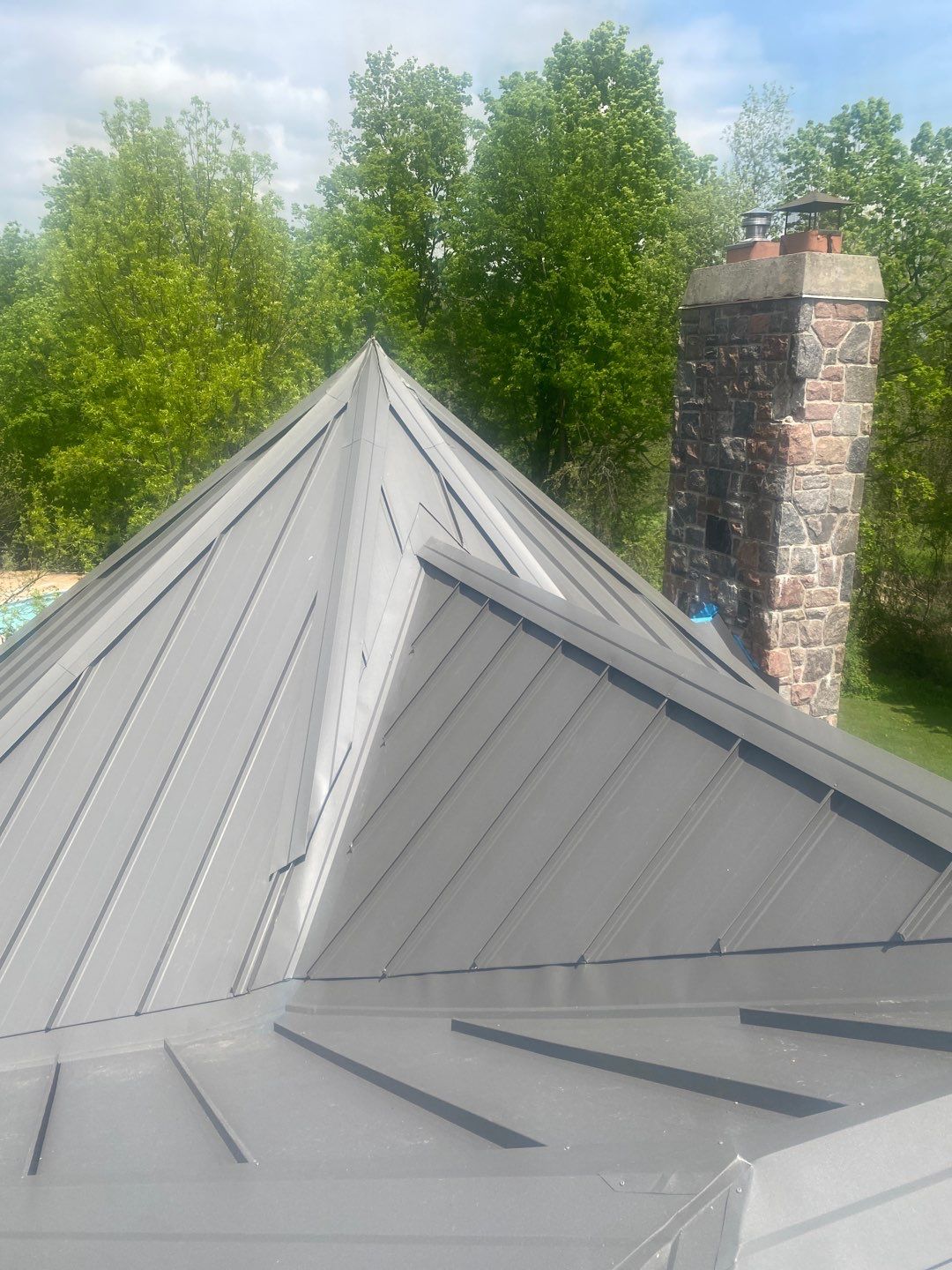 New Roof Installation using 16" Standing Seam Panels by Jay Carter Roofing & Sheet Metal