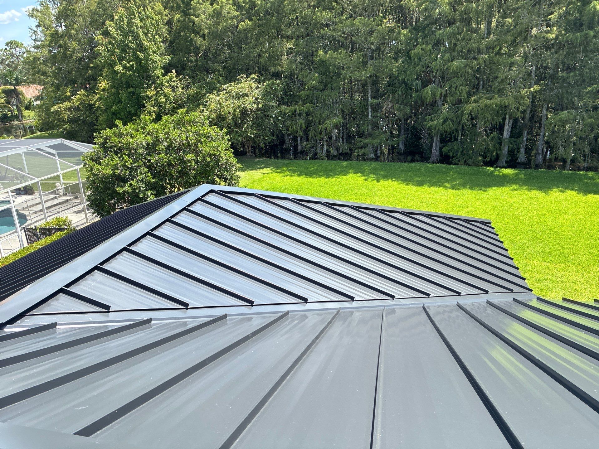 24ga 1.5" Mechanical Seam Matte Black by Total Roofing System The Metal Roof Experts