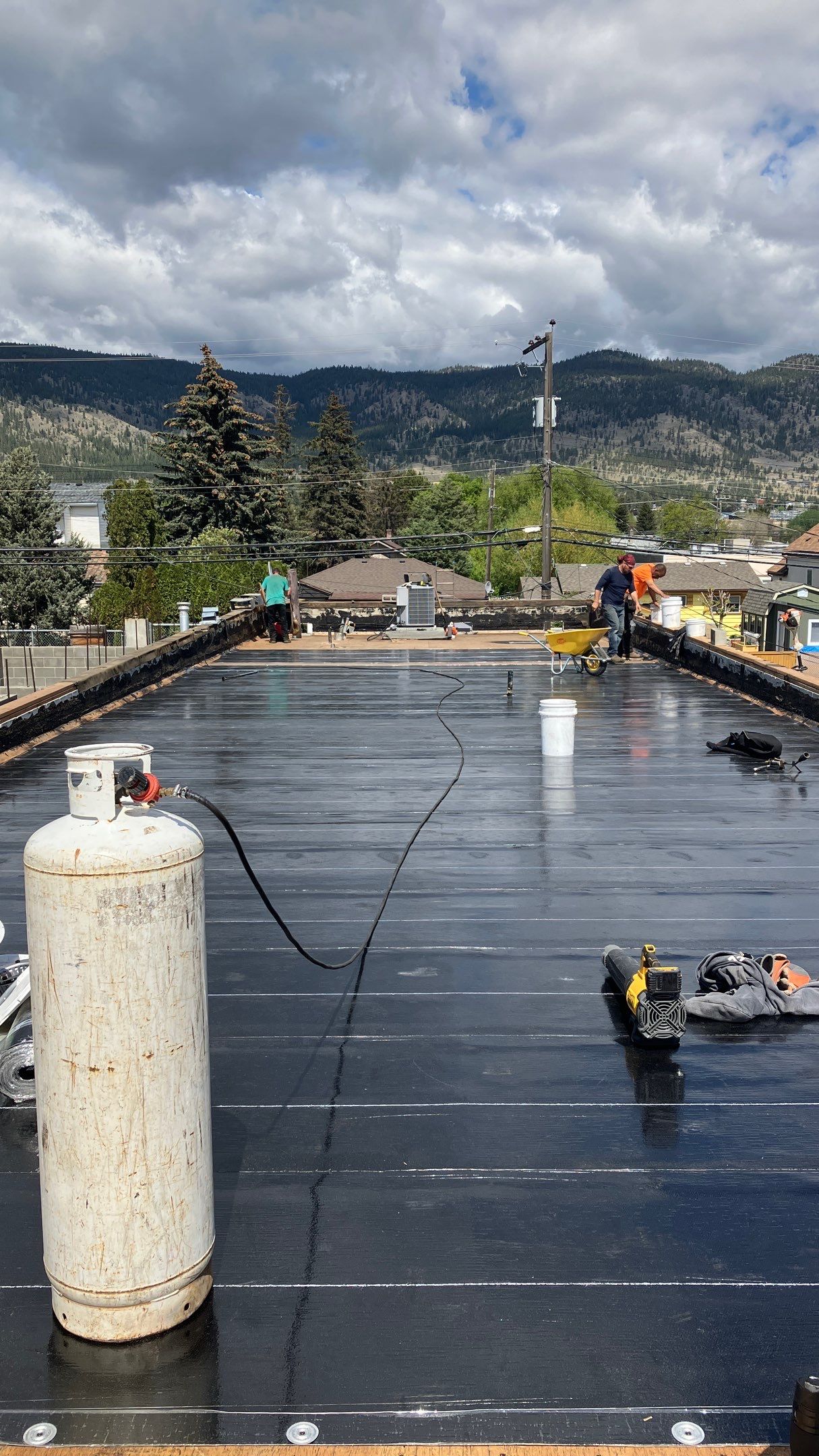 Commercial ReRoofing Installation using IKO 2ply sbs by Top Notch Roofing Inc