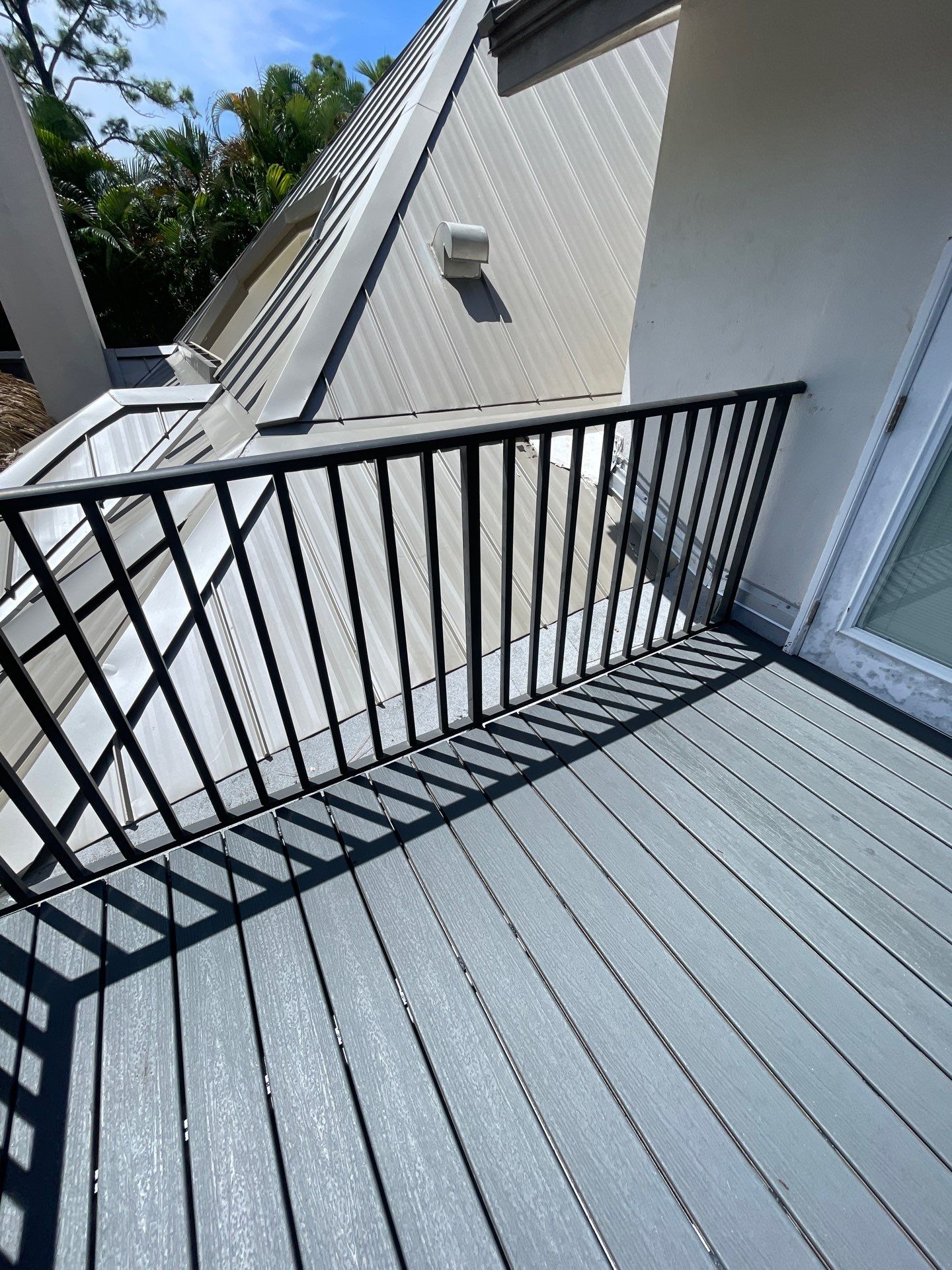 TPO Membrane- Trex Deck in Clam Shell color Balcony by Durabilis Roofing INC