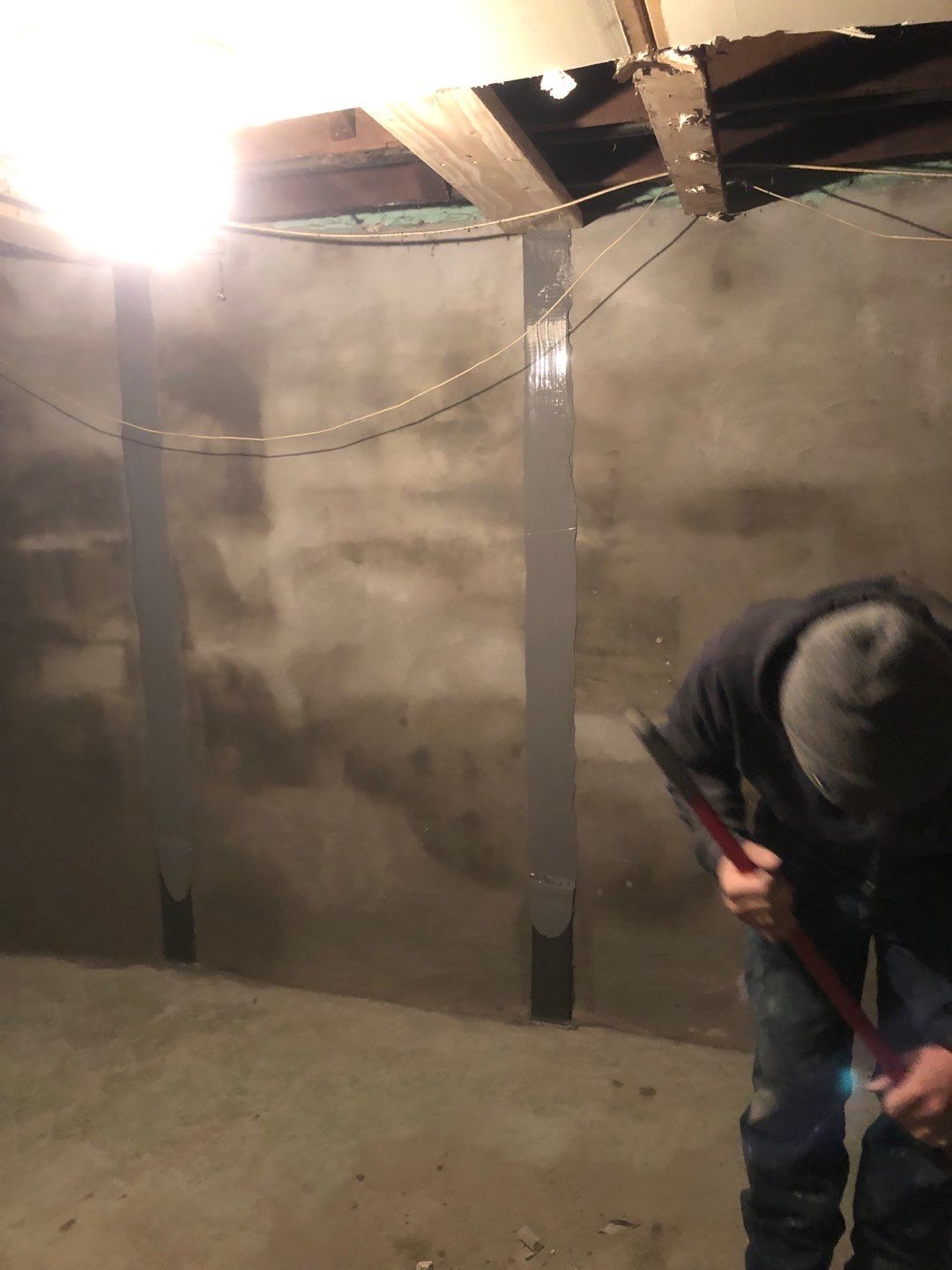 Wall repair with Fortress Invisibeams by ACE Waterproofing & Basement Solutions