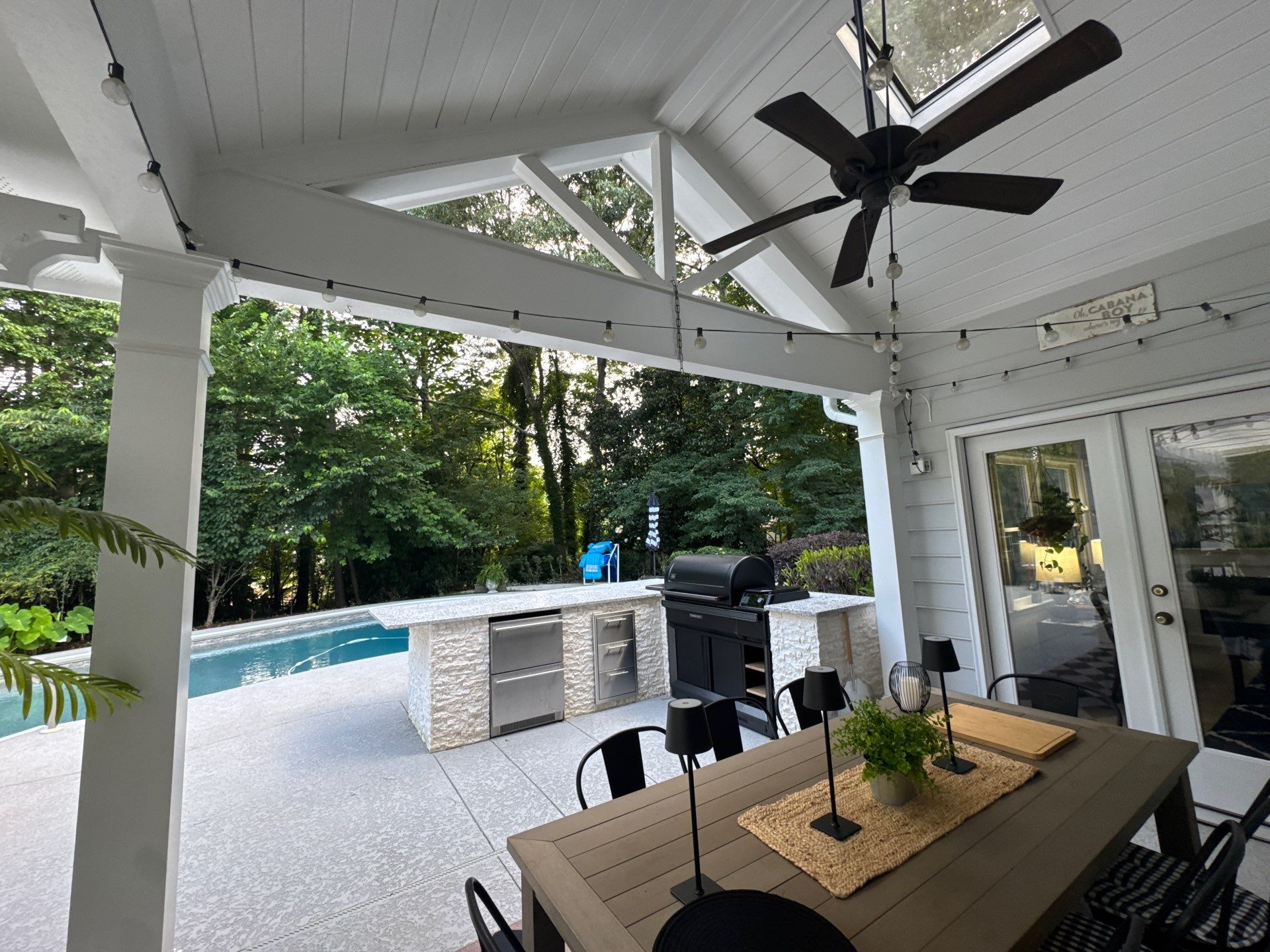 Marietta Poolside Pavilion with Custom Outdoor Kitchen and Pergola by Swift Home Renovations
