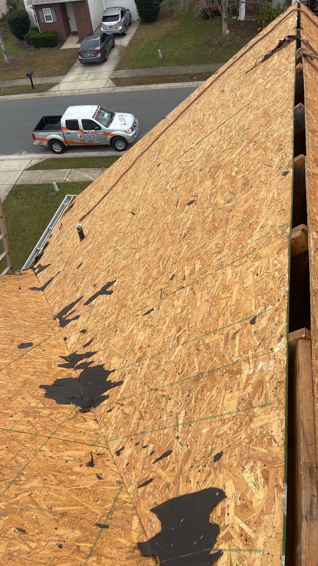 Roof replacement by wind damage by Just Brilliant Restoration JBR