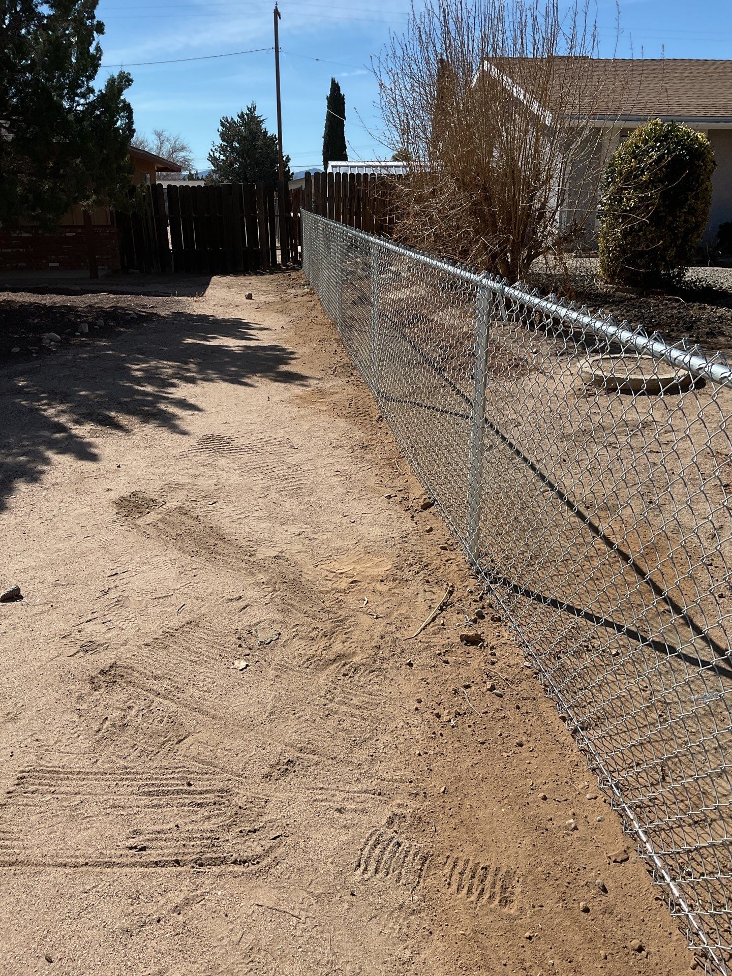 Fence Installation using chain -link by Fence Guys Inc.