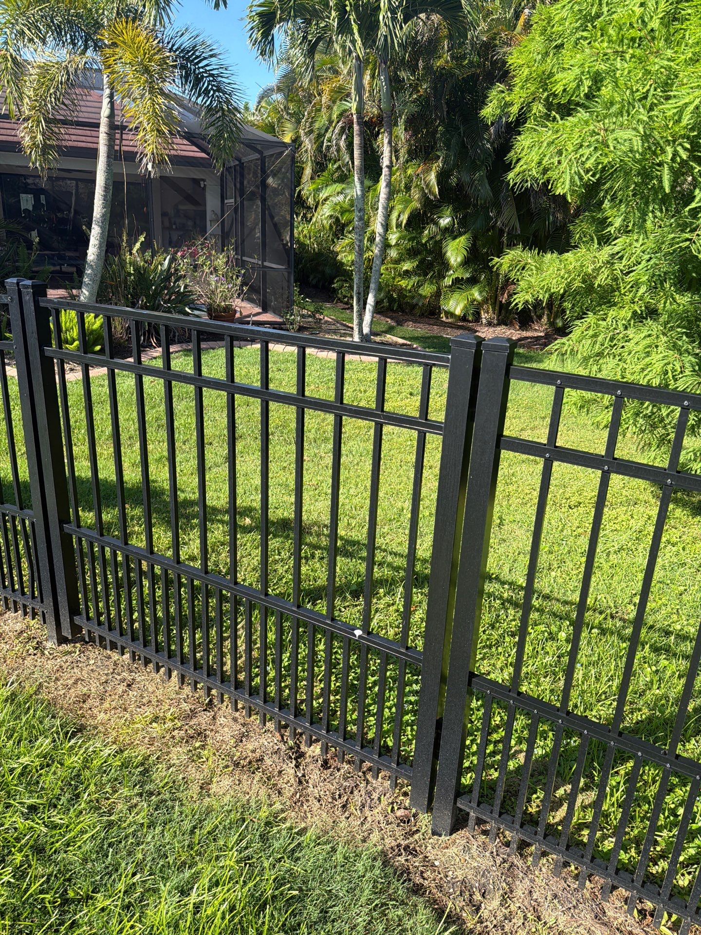 customer with puppy picket aluminum  by H&Y Fence