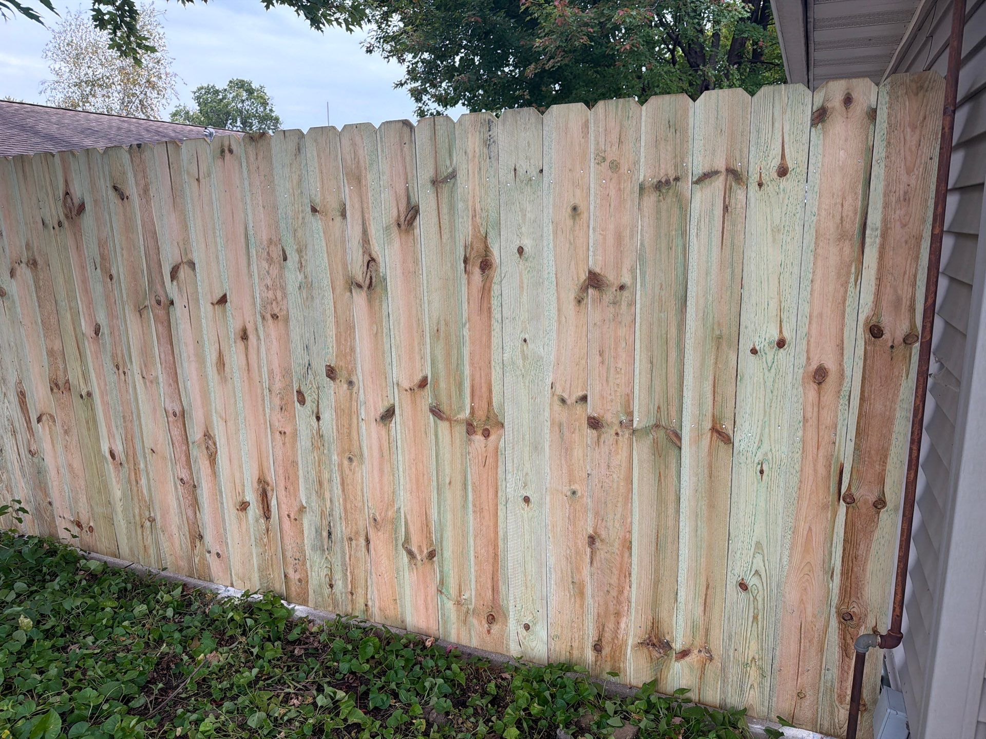 Custom Wood Privacy and Black Chain Link Fence in Hudson by Perfect Picket Fence and Stain