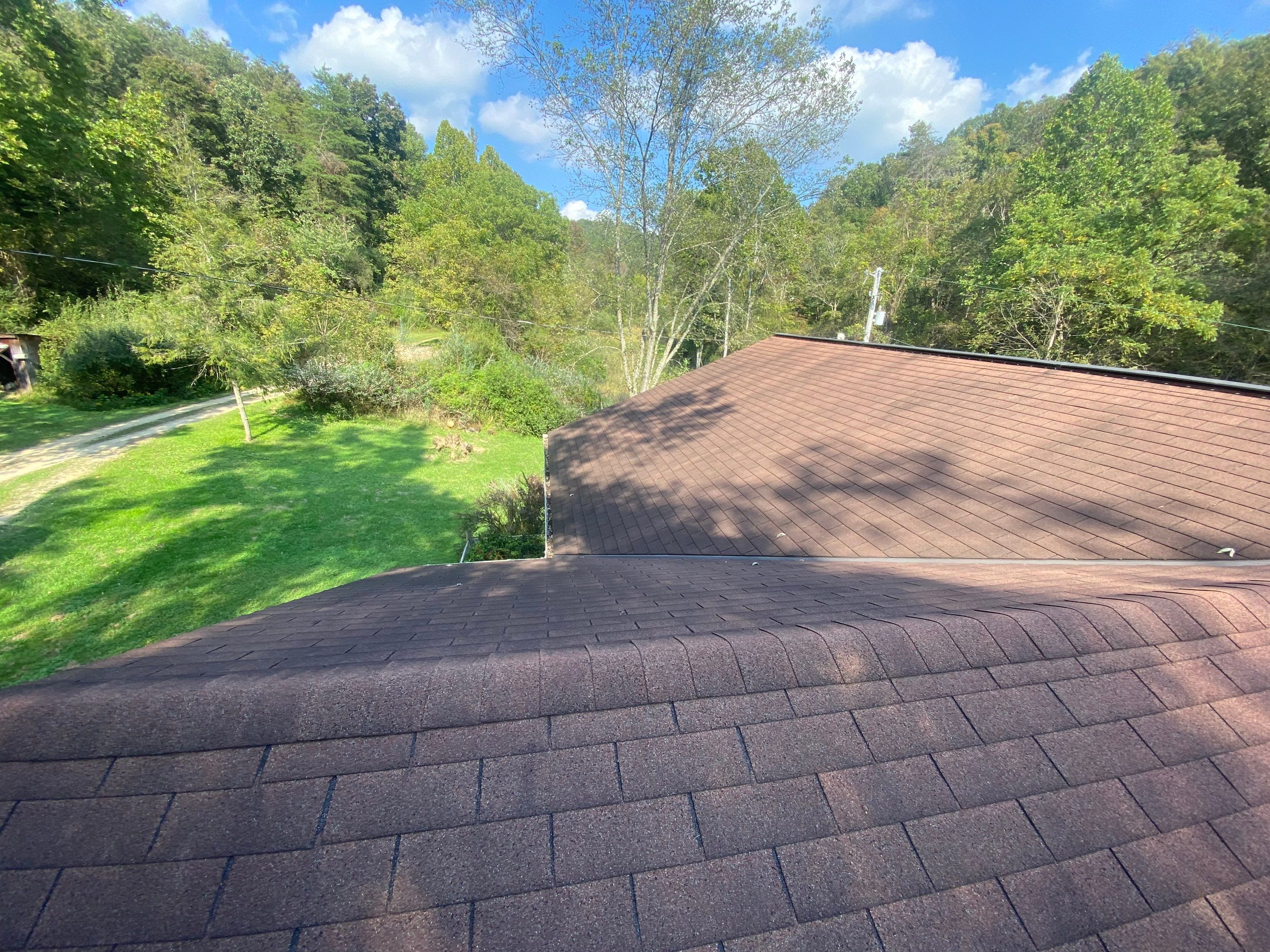 Metal Roof and Vinyl Siding, Soffit, Gutters using LifeTite Premium metal roofing  by Secure Construction Company Inc