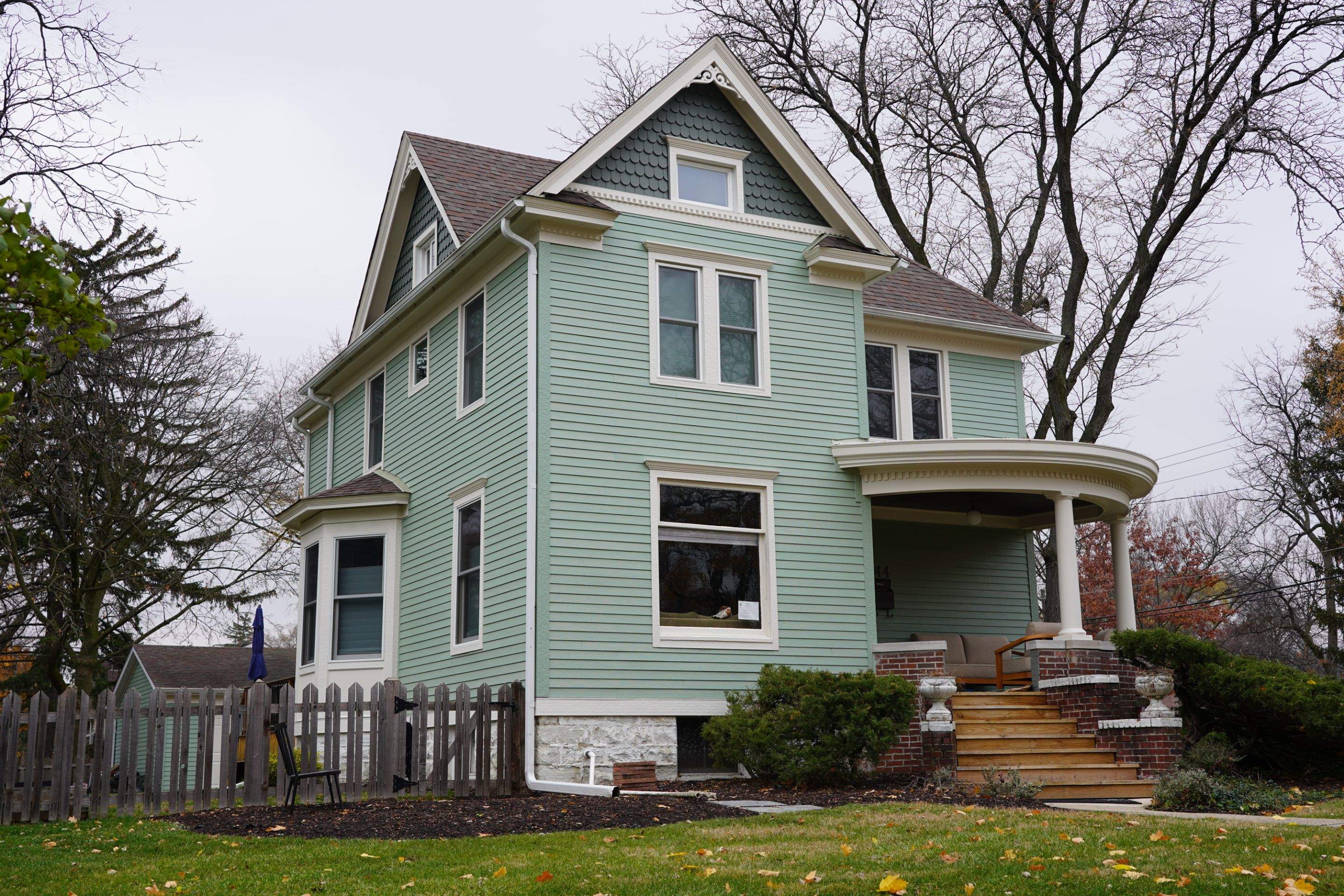 Glen Ellyn Exterior Renovation Featuring James Hardie Siding and Porch Restoration