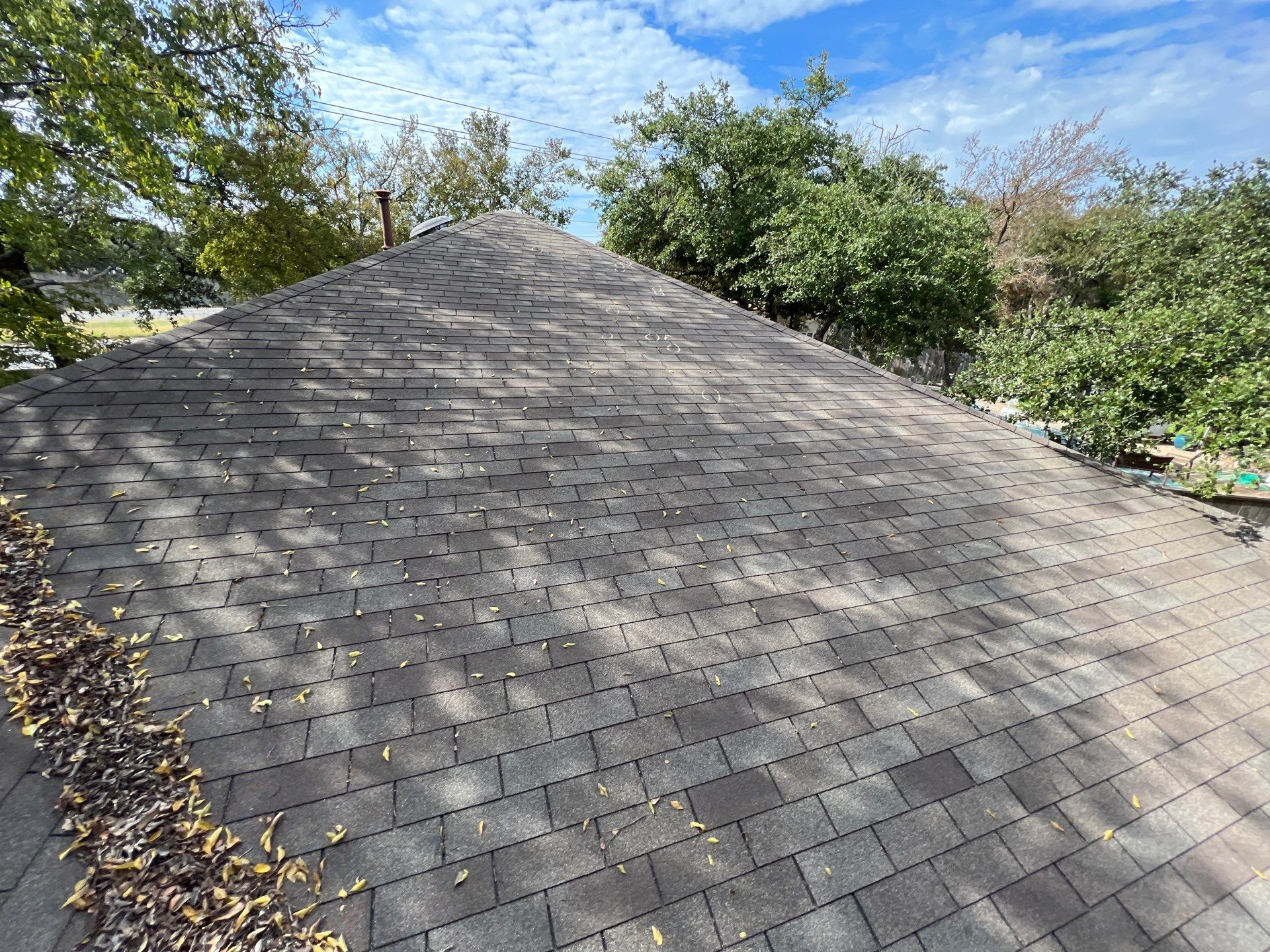 Rental property upgrade using CertainTeed Landmark shingles. by Oakwood Roofing and Construction, LLC