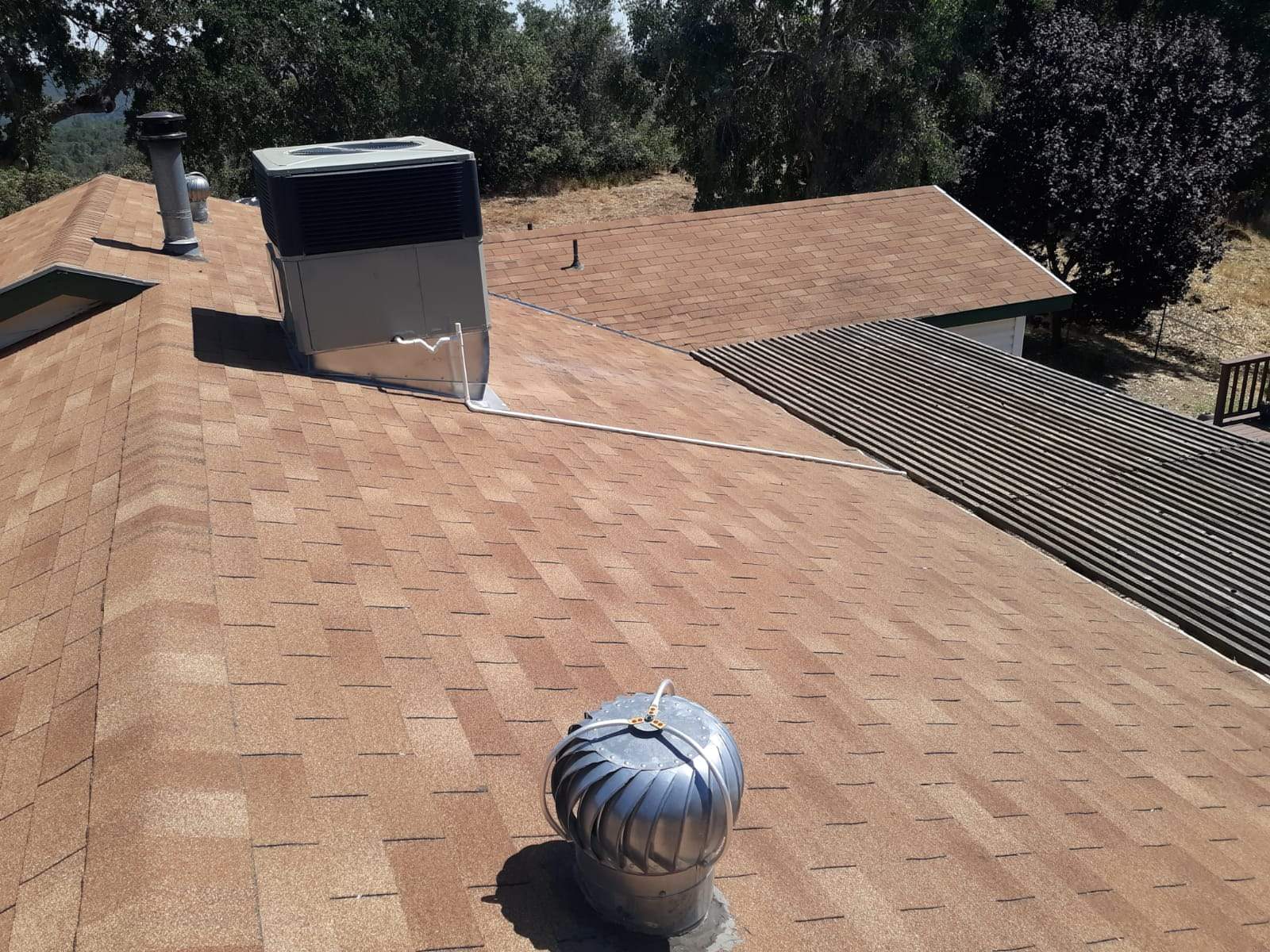 Metal roofing installation using Standing seam metal roofing system by Straight Edge Roofing Inc