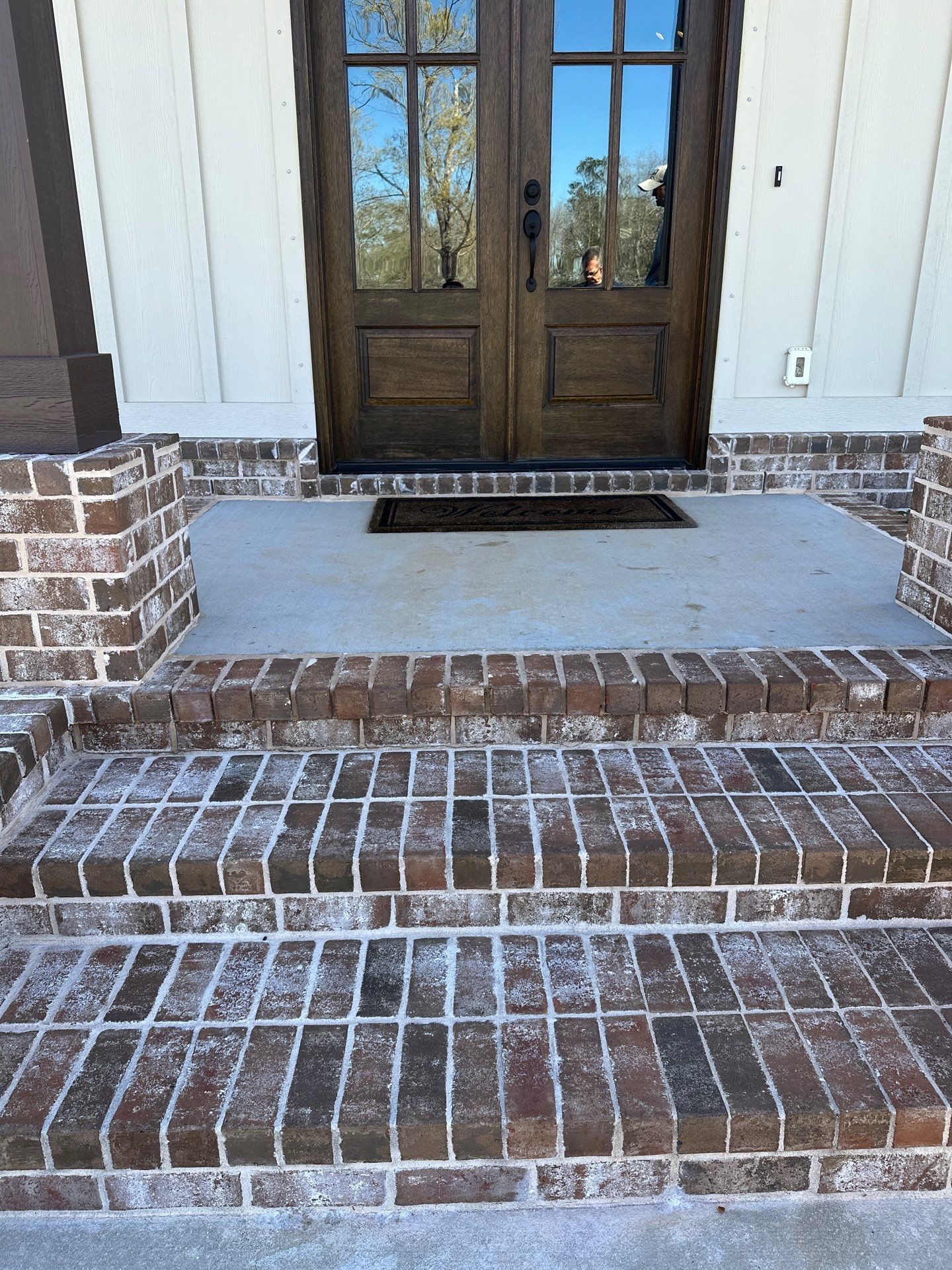 Decorative Stained Concrete Overlay and Garage Floor Coating in Mobile by Cornerstone Hard Surface Restoration 