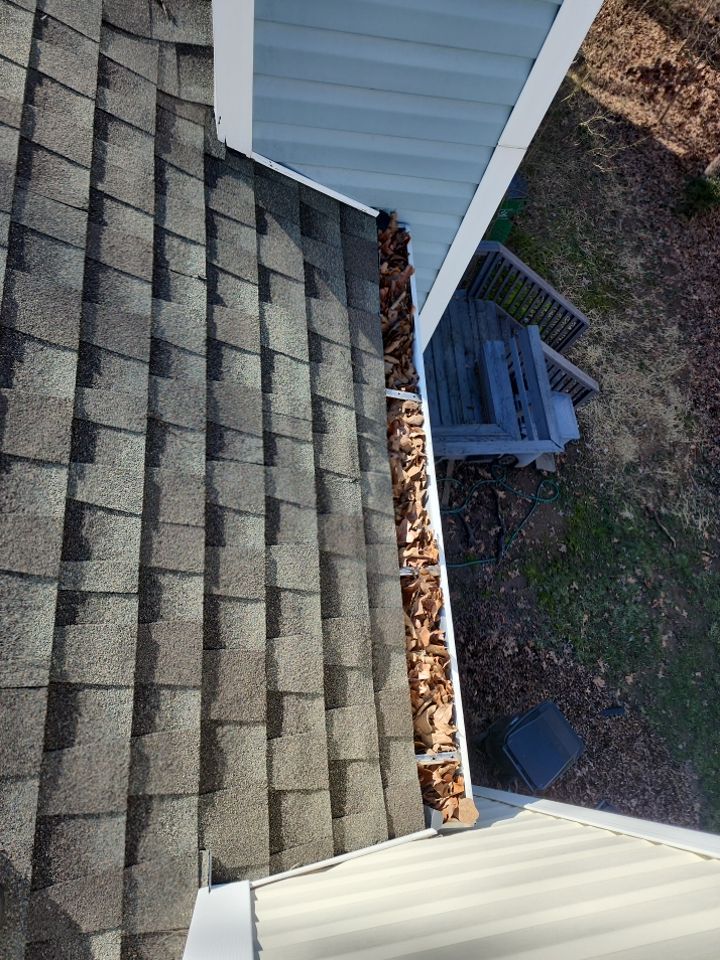 Gutter Cleaning using water by Power Wash Masters LLC