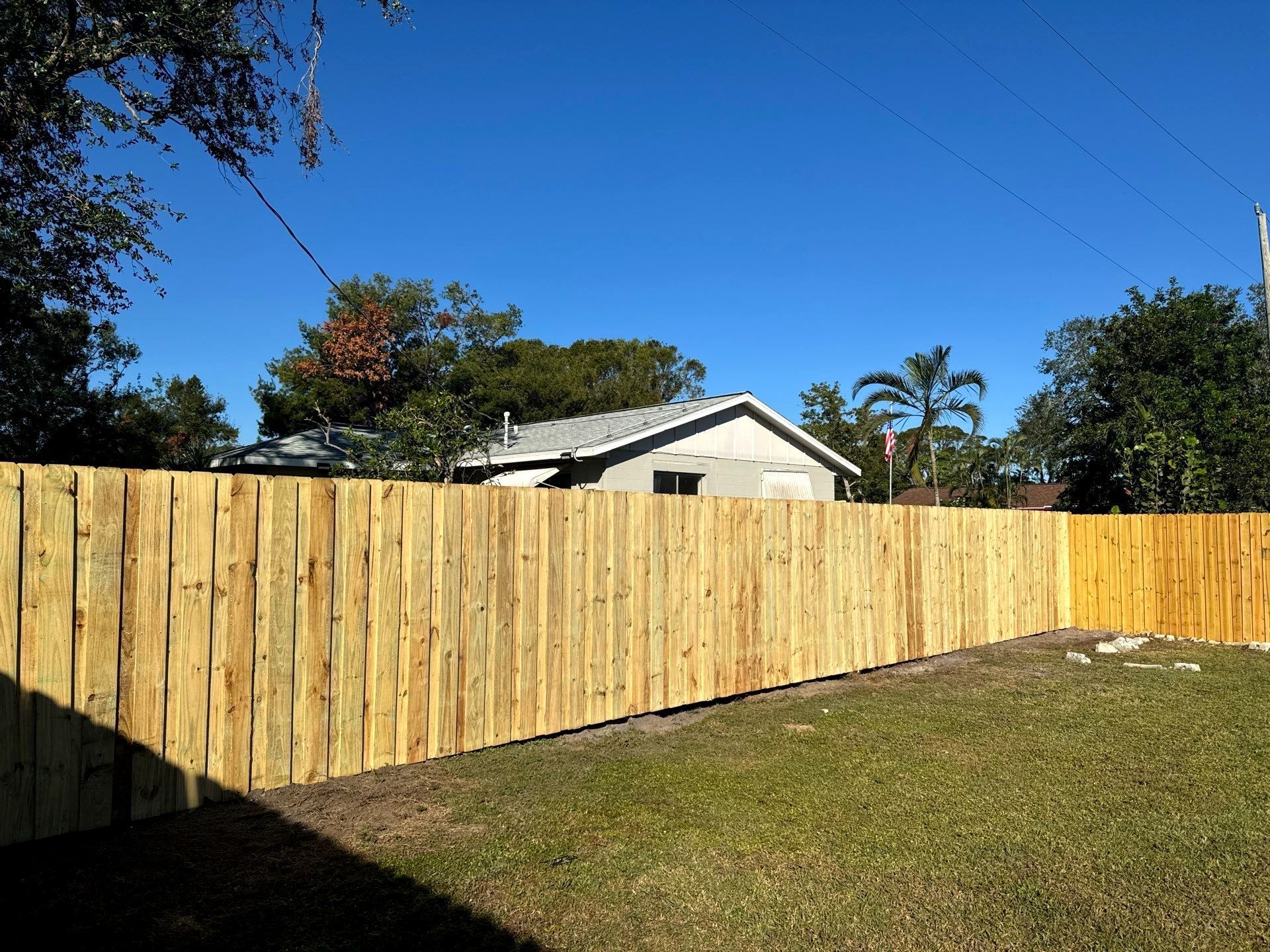 Wood Fence Installation using 6Ft Pressure Treated Wood Board On Board Privacy Fence by Asap fence and gates, LLC