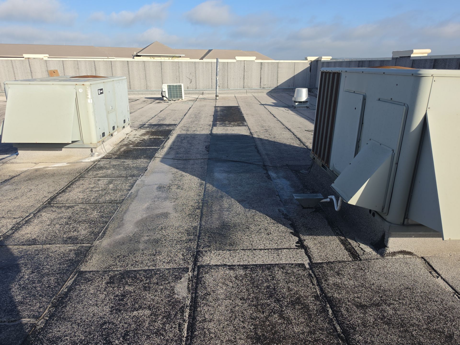 Modified Bitumen repairs.. a couple thousand dollars can save TENS of thousands and greatly prolong the life of your roof. by REPS Austin Area Roofer