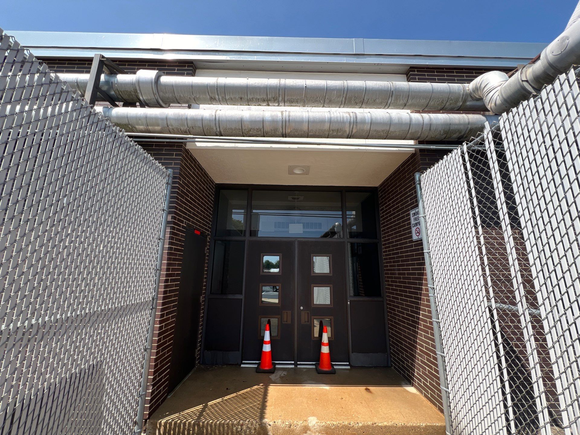 commercial pressure washing using Algaecide, soft wash soap by Northern Power Washing LLC.