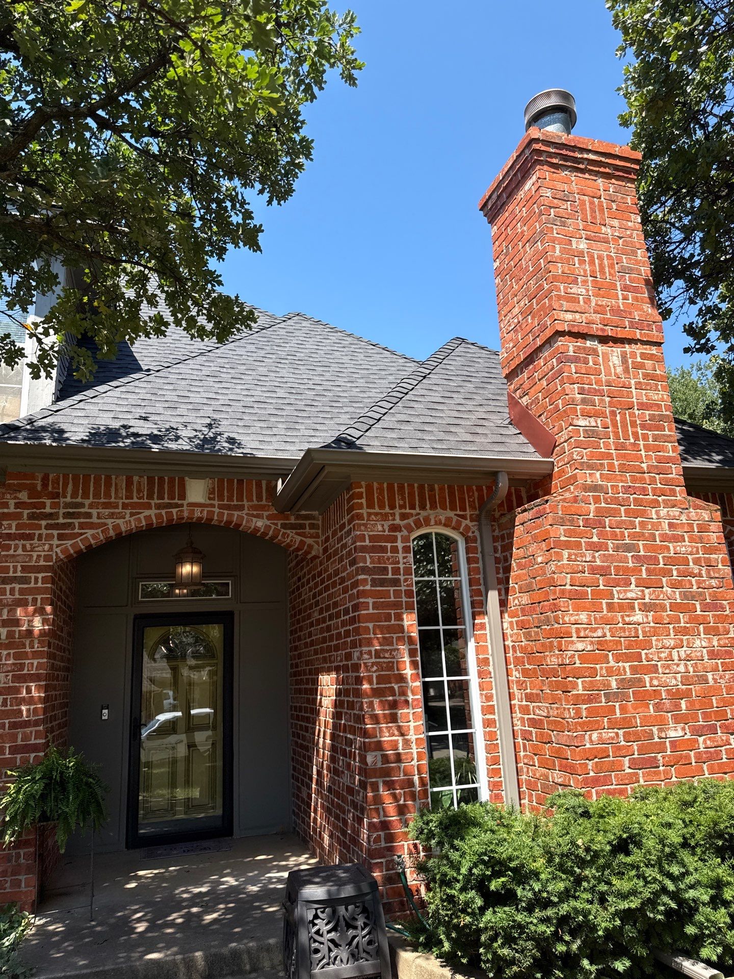 roof replacement & skylight repair in Edmond by McCann's Roofing and Construction