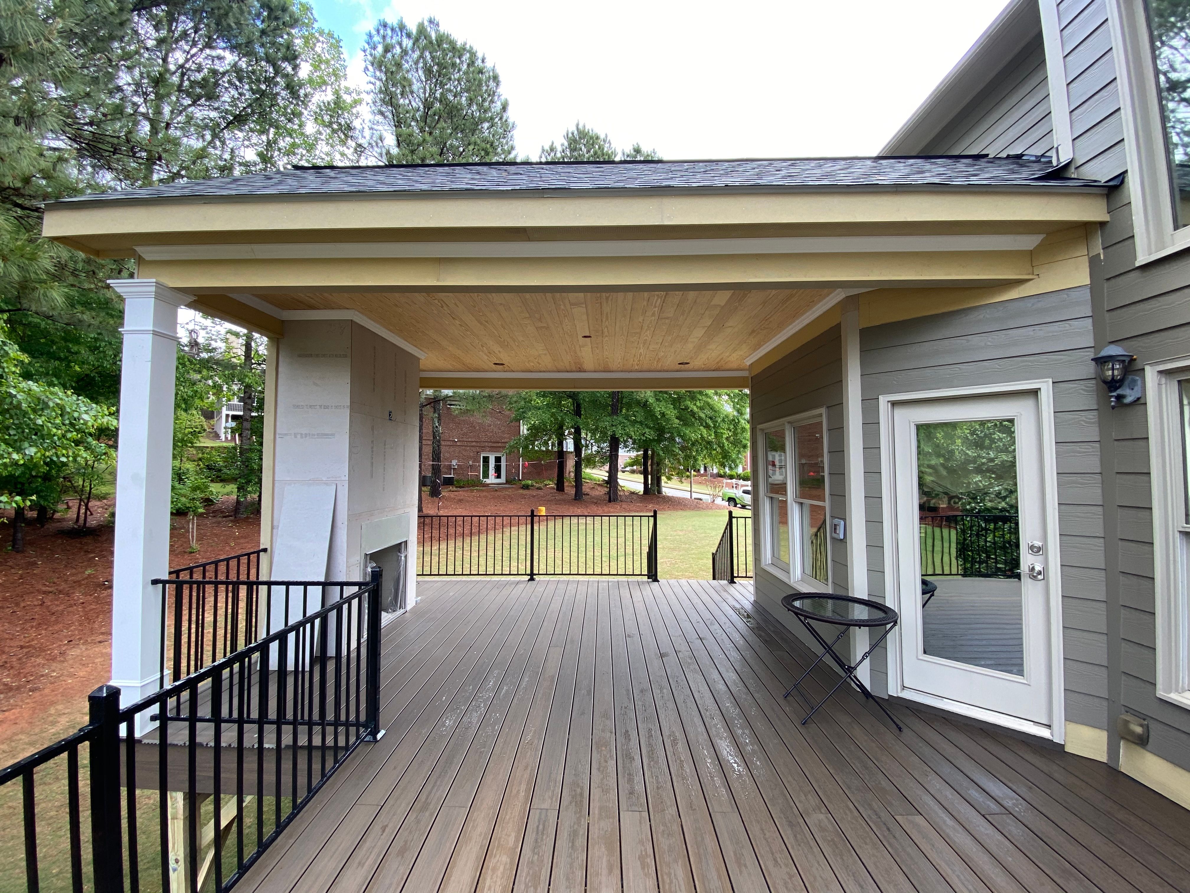 Covered Porch and Composite Deck Addition in Woodstock by Swift Home Renovations