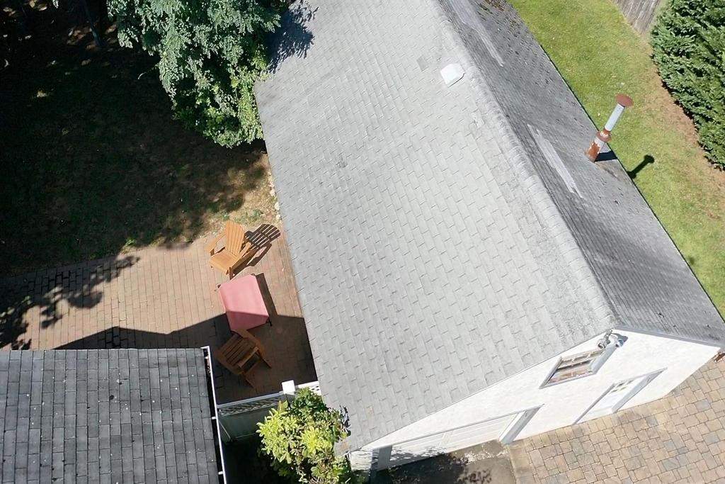 New Roof & Gutters by Island Roofing Inc.