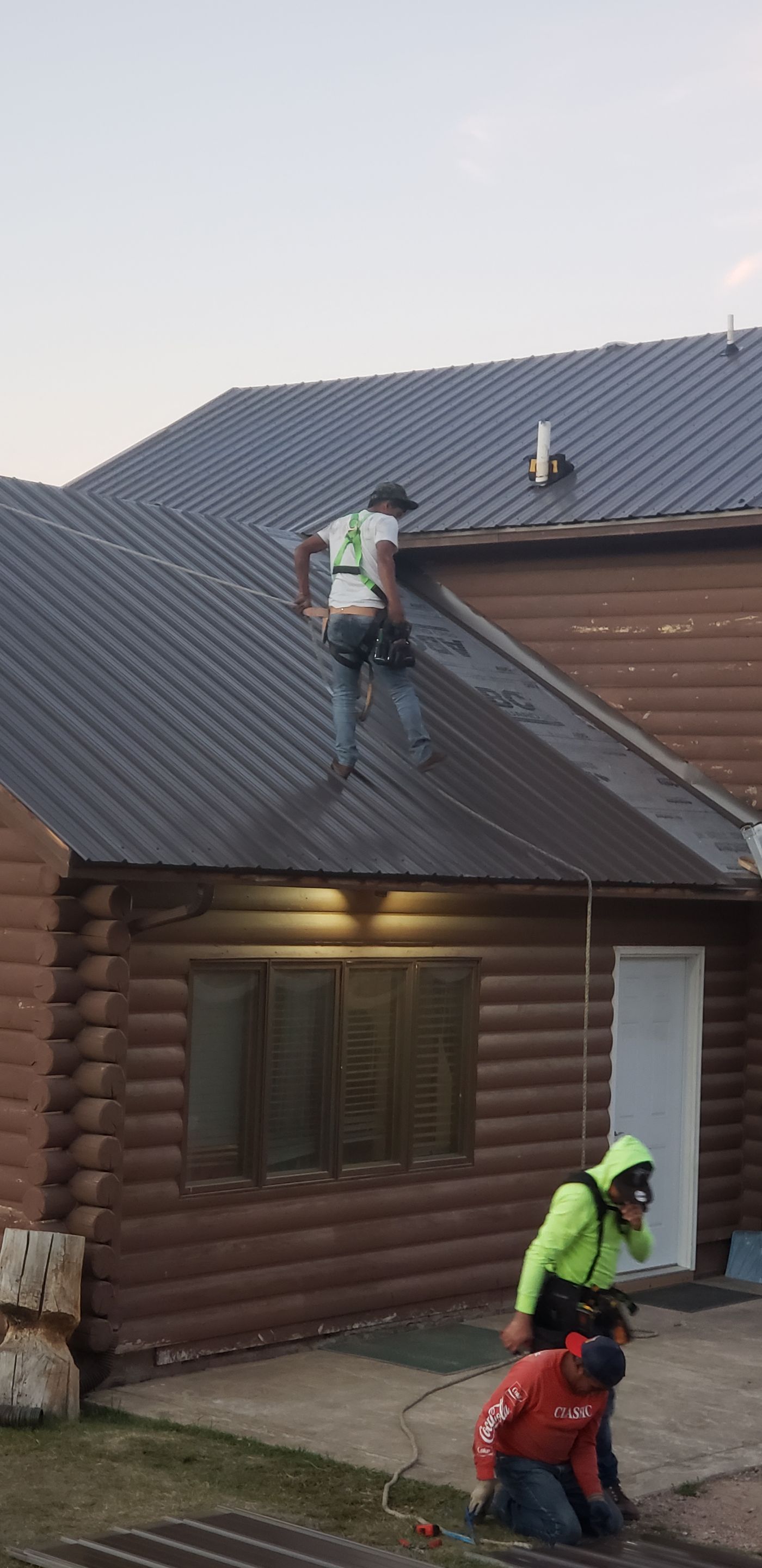 Hill Country Guest Ranch using Steel Roofing, Gutters, Log Cabin Staining by Lightning Exteriors