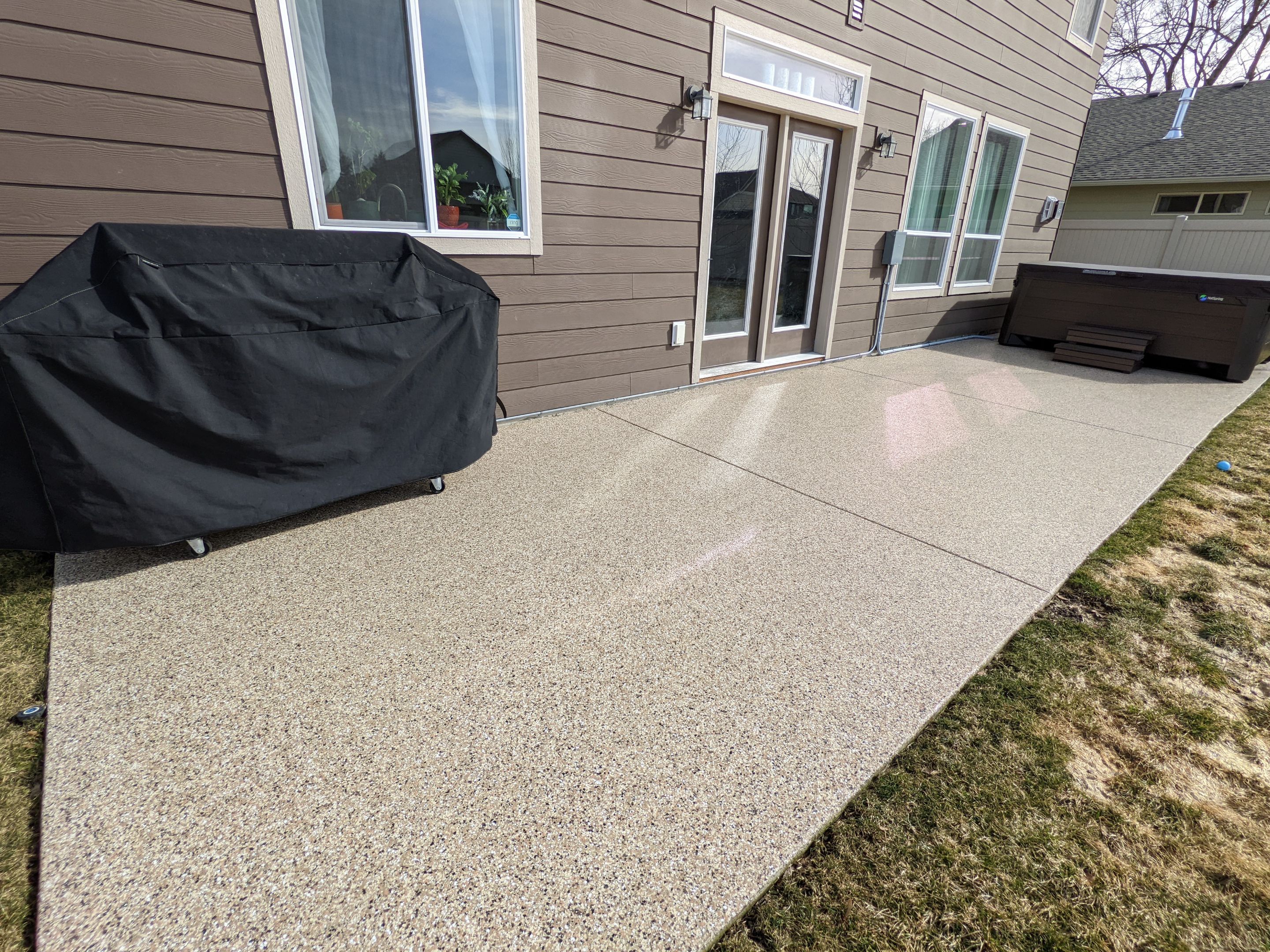 Patio Transformation using Sandstone by Croc Coatings, LLC
