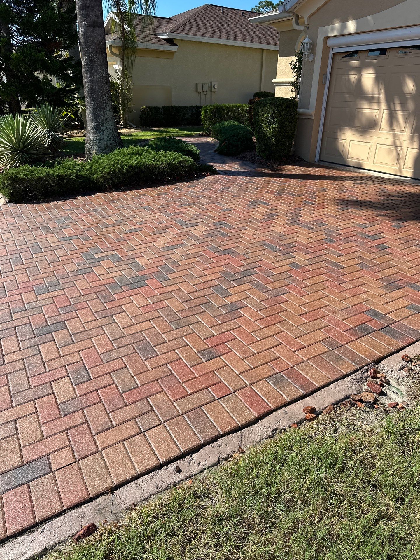 Restoring Multi-Tone Paver Driveway and Walkways in Sun City Center by Supreme Paver Experts