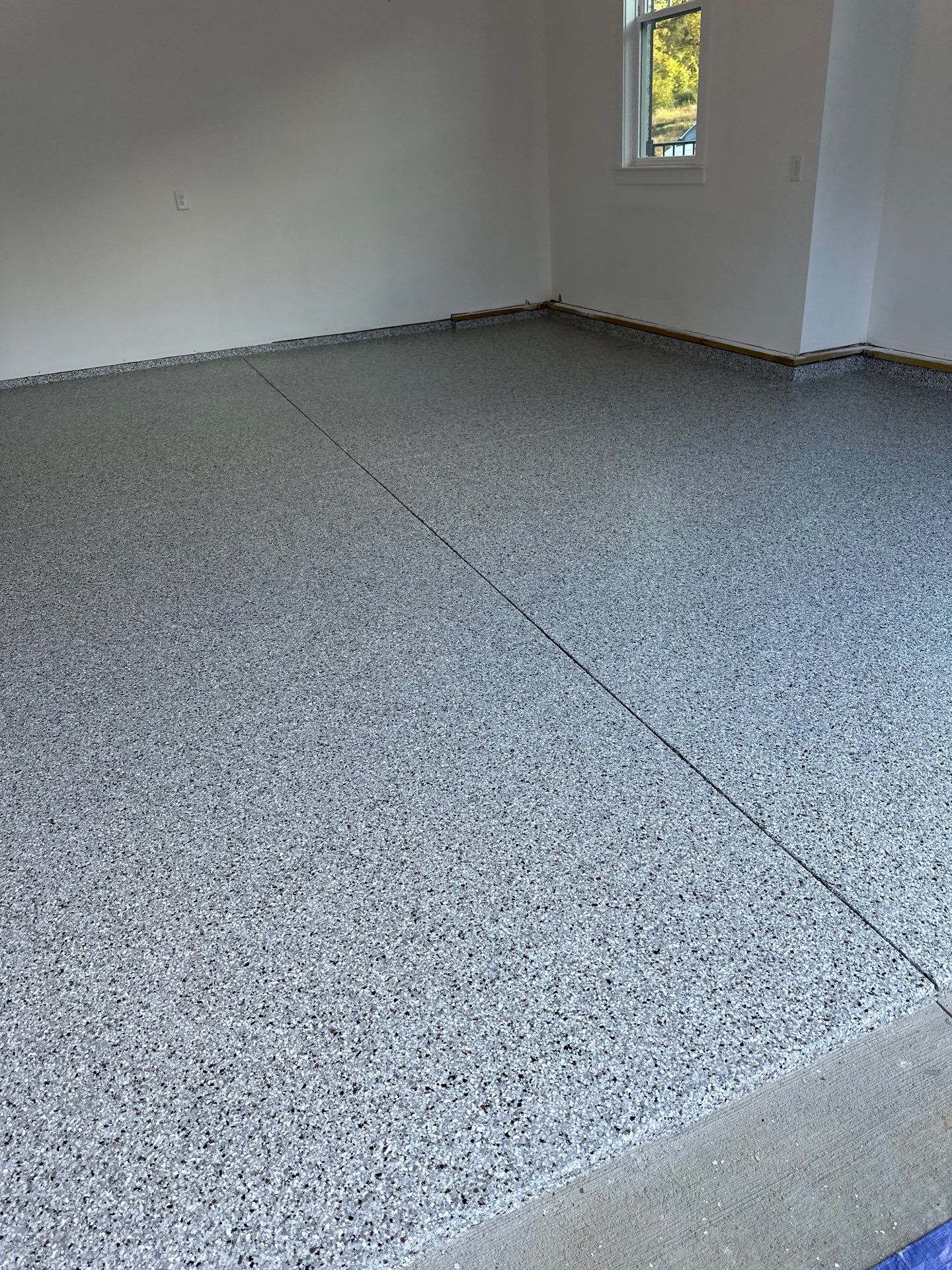 Garage Floor Coating using Coyote by My Garage Floor Guys