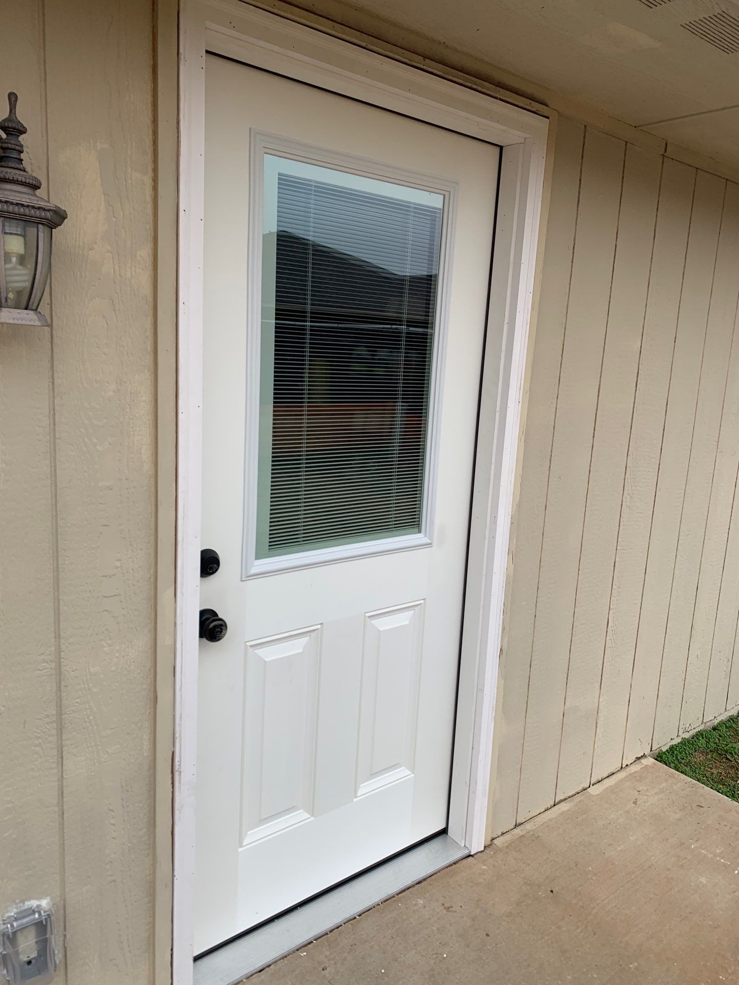 door replacement in Yukon by McCann's Roofing and Construction