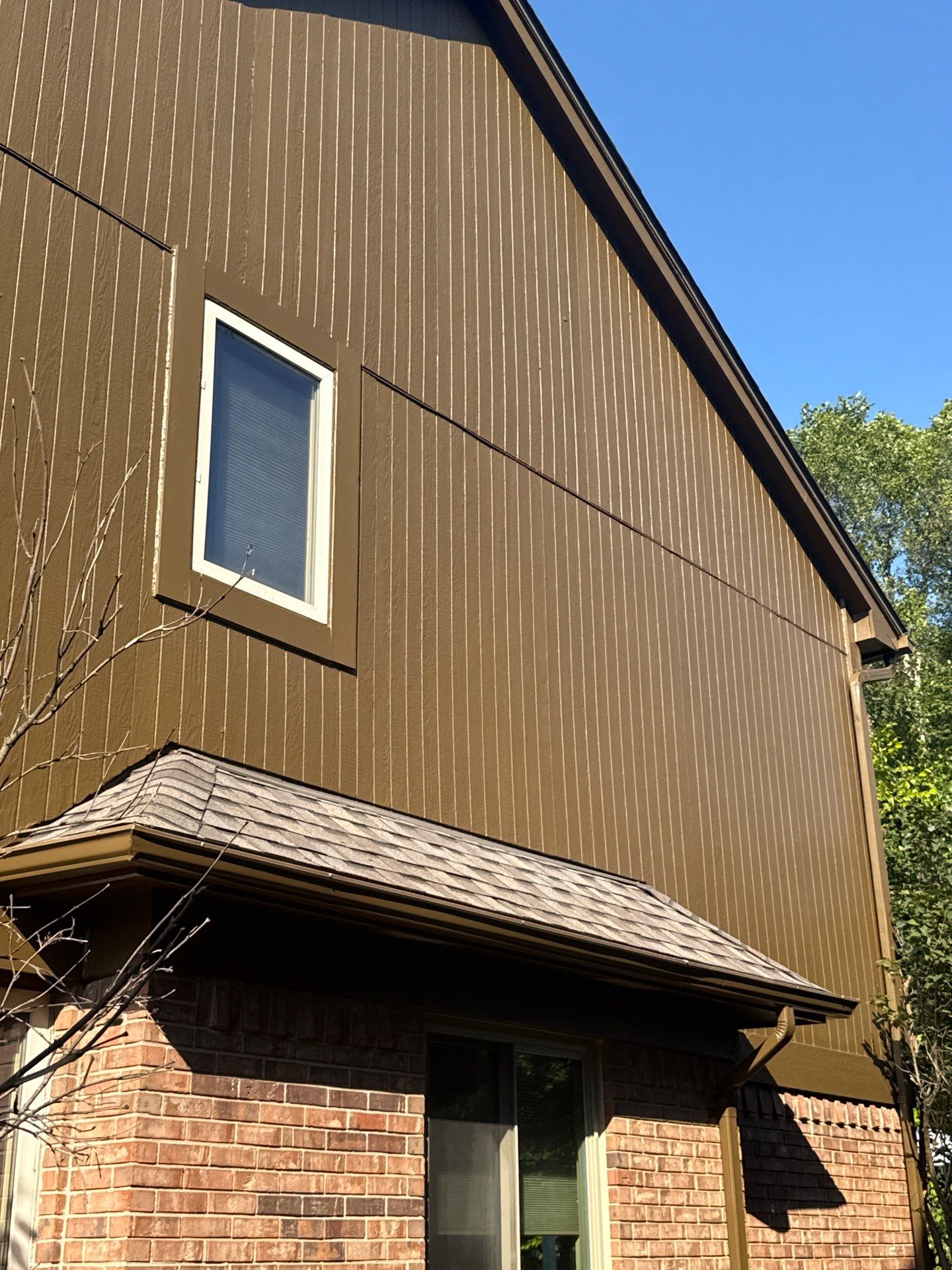 Siding and Wood Trim Repair for Washington Residential Property by Top Shelf Painter