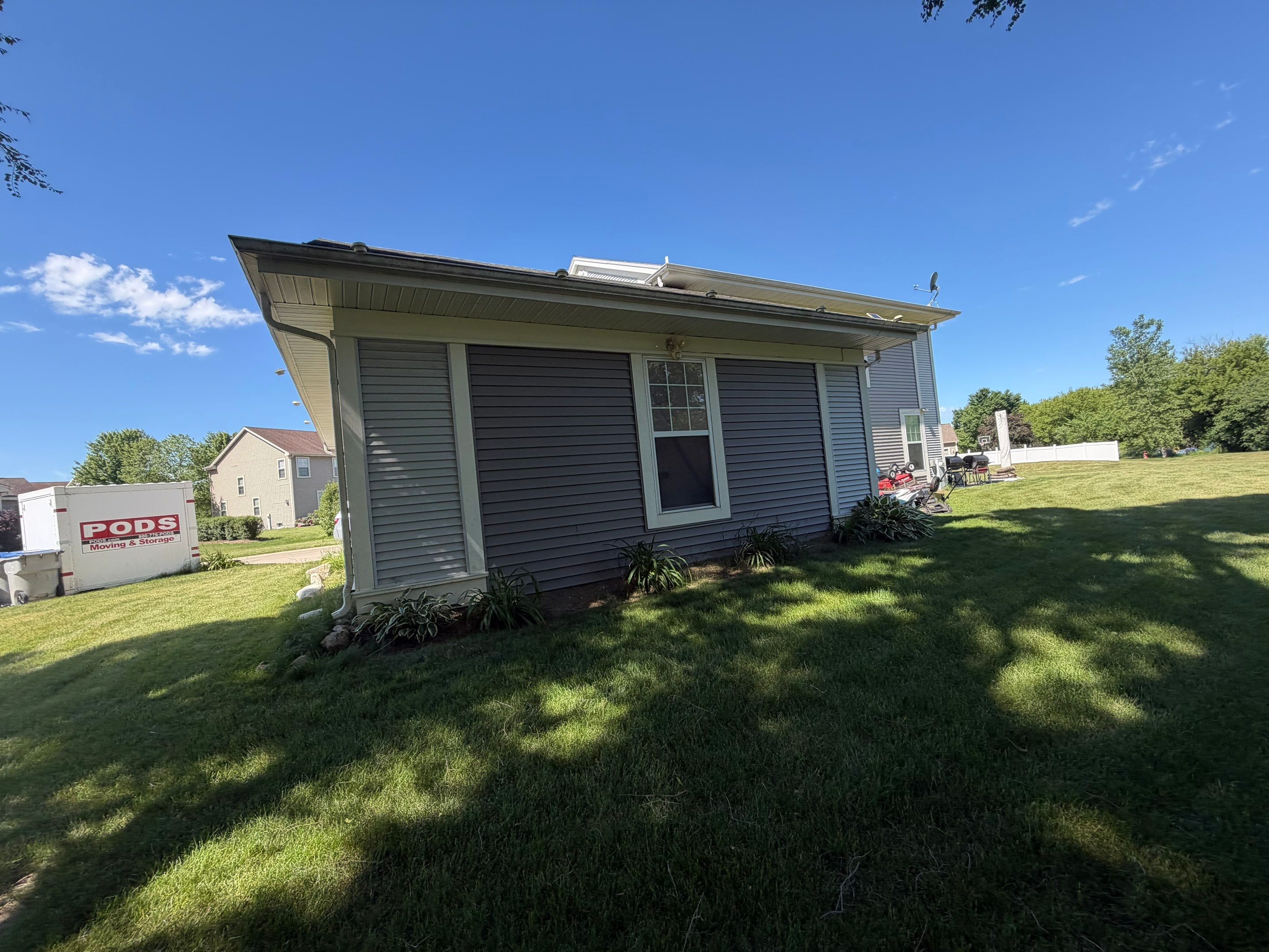 Vinyl Siding Replacement and Multi-Room Interior Renovation in Milwaukee by OCS Contracting Services