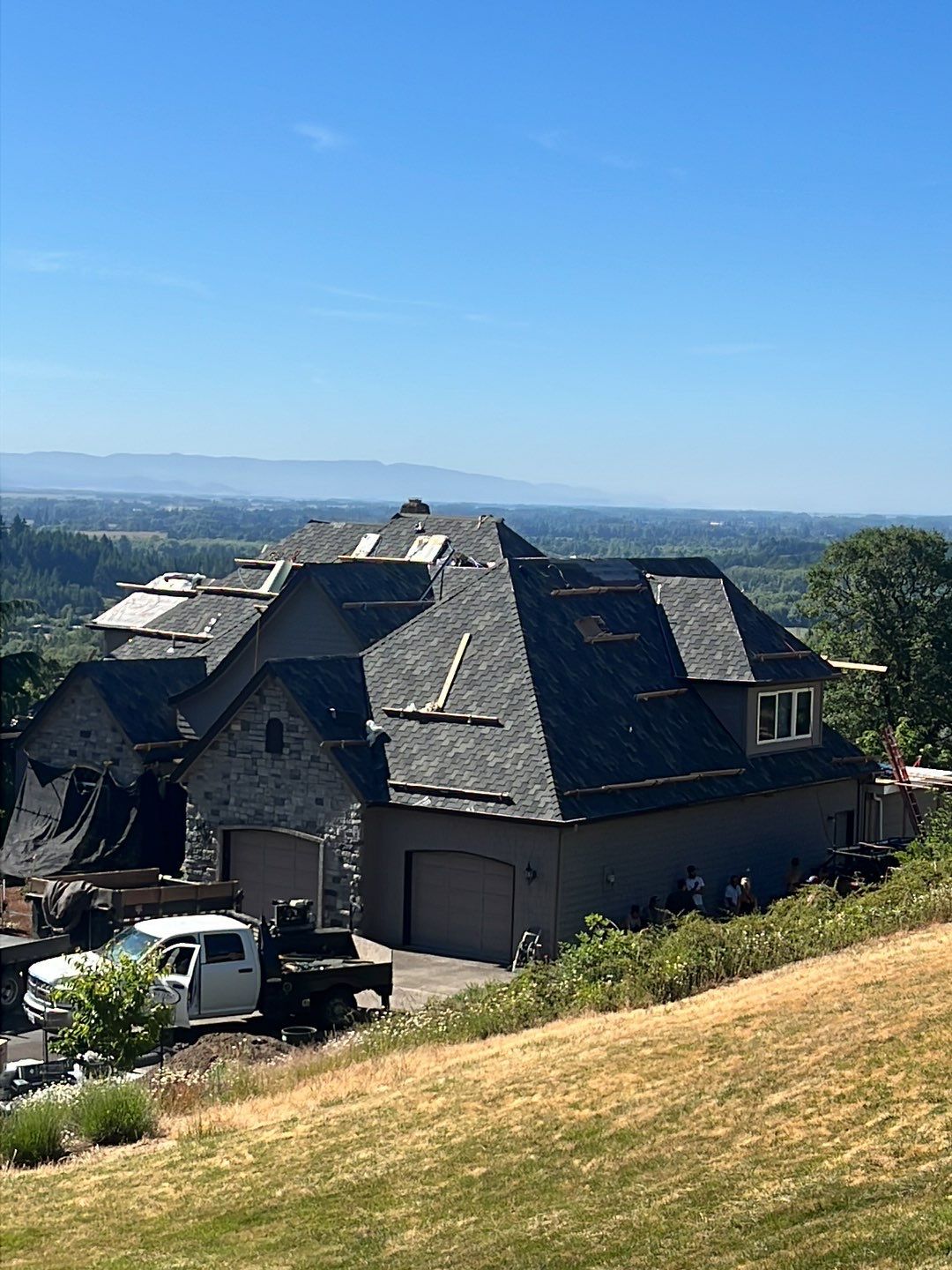 Residential Roofing Installation using Malarkey Windsor 50 Year Shingle (Color: Storm Grey) by Orezona Building & Roofing Company, Inc.