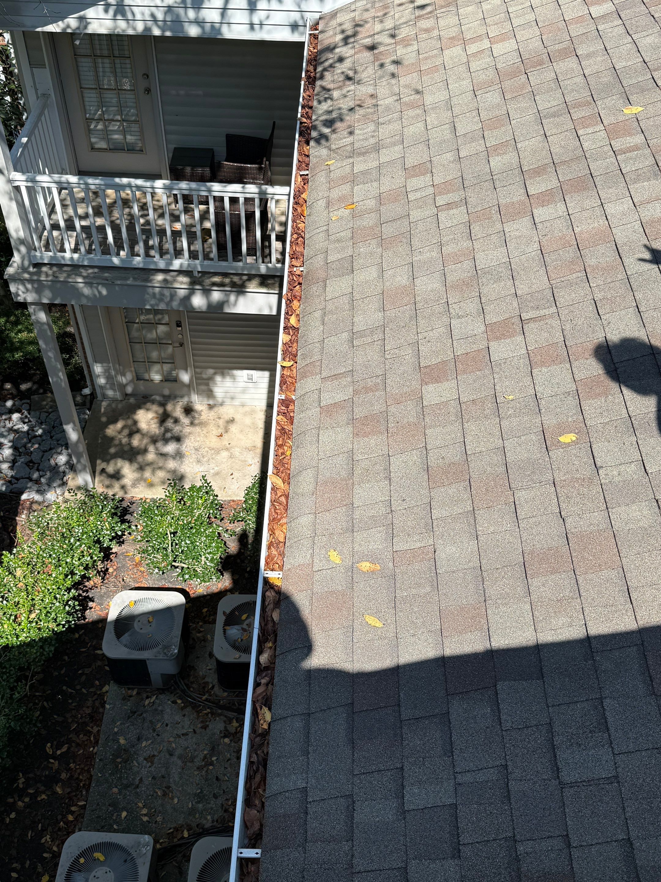 Commercial gutter cleaning Lebanon, TN before photo with filled gutters