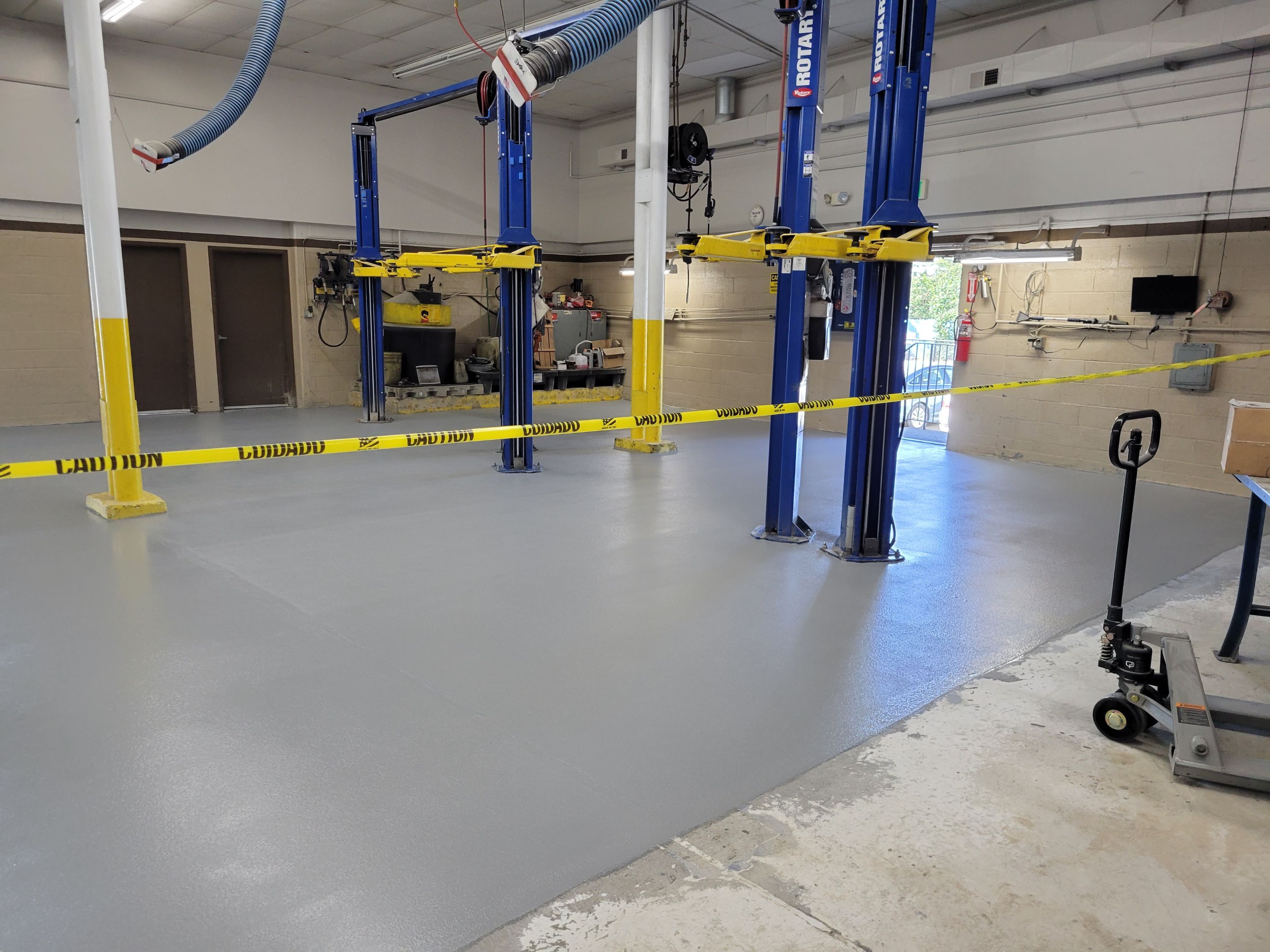 Commercial Floor Transformation using Penntek Shop Floor System by Croc Coatings, LLC