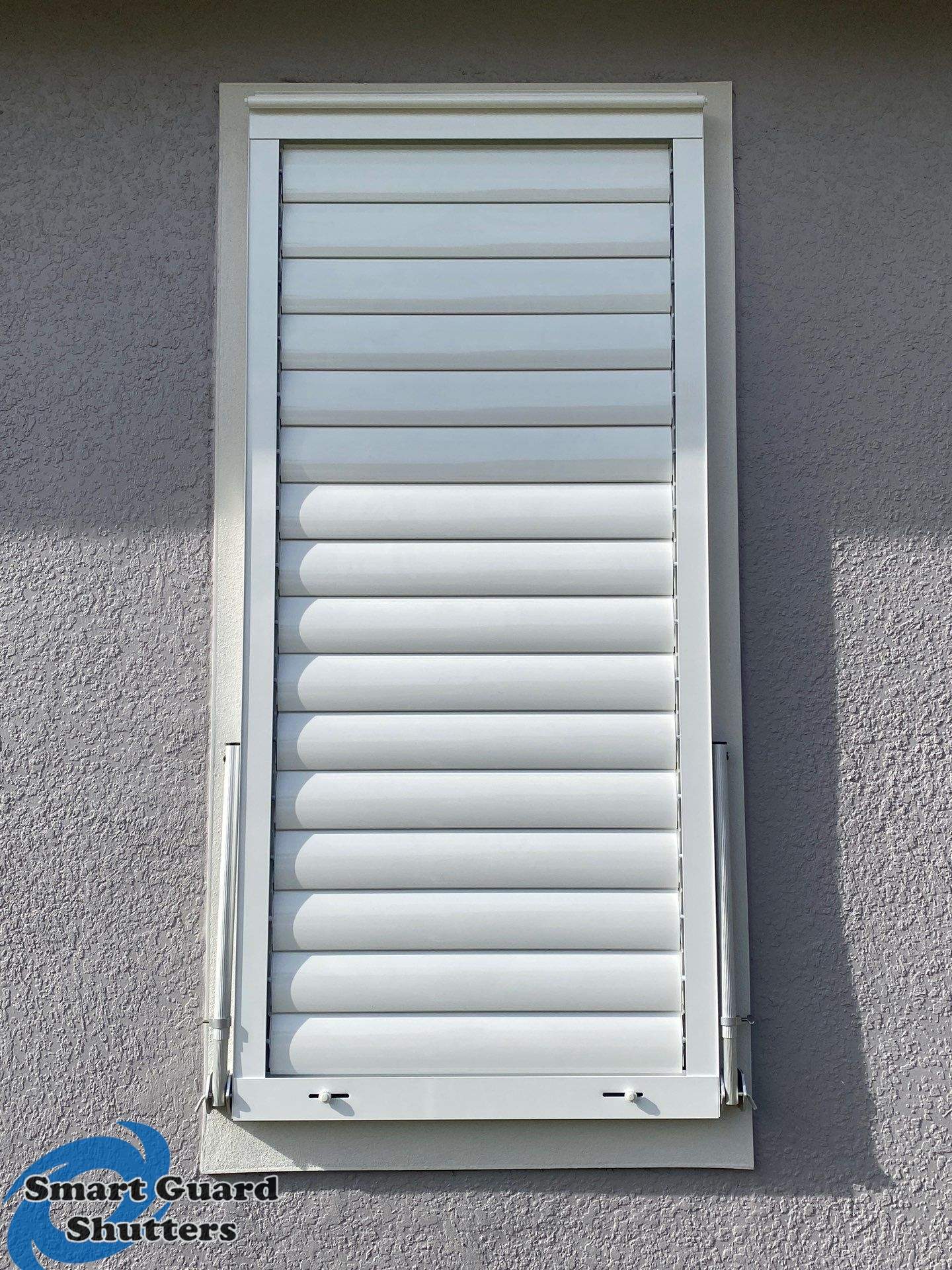 Impact Bahamas in Signal White by Smart Guard Shutters