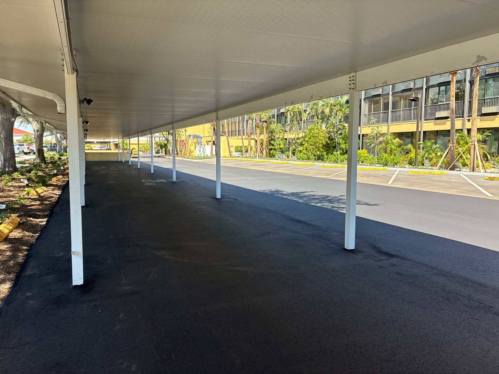 Comprehensive Parking Lot Mill and Overlay with Custom Line Striping in Venice by Everline Coatings & Services - Southwest FL