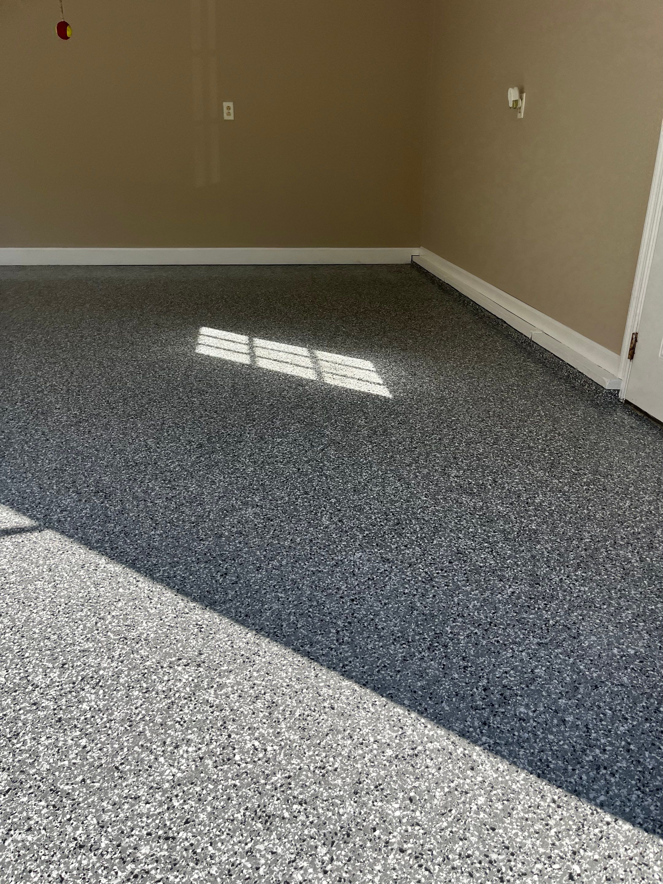 Garage Floor Coating using Wombat by My Garage Floor Guys