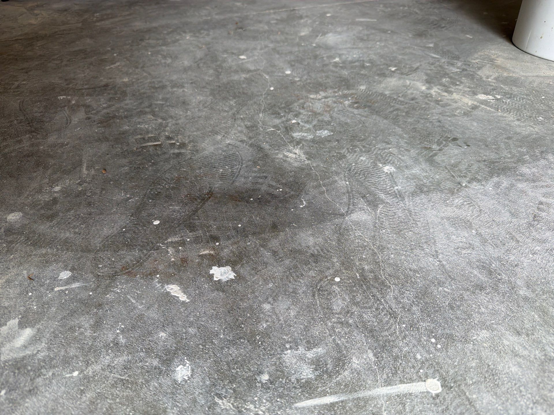 Decorative Chip Concrete Coating Installation in Luverne by Select Painting, Coatings & Garage Cabinets