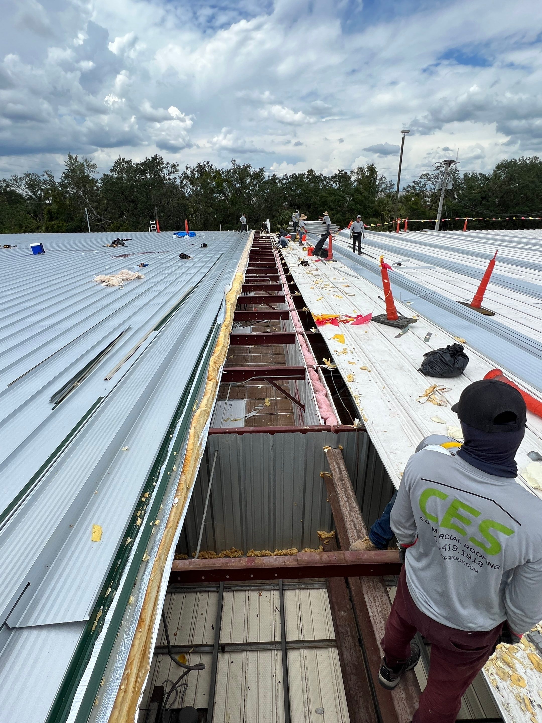 Commercial Metal Roof Replacement at Shopping Plaza in Port Charlotte by CES Roofing