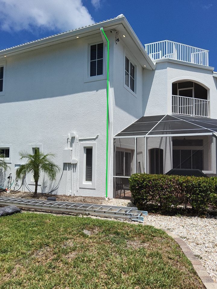 White Gutter Installation Sanibel FL by Gutter Professors